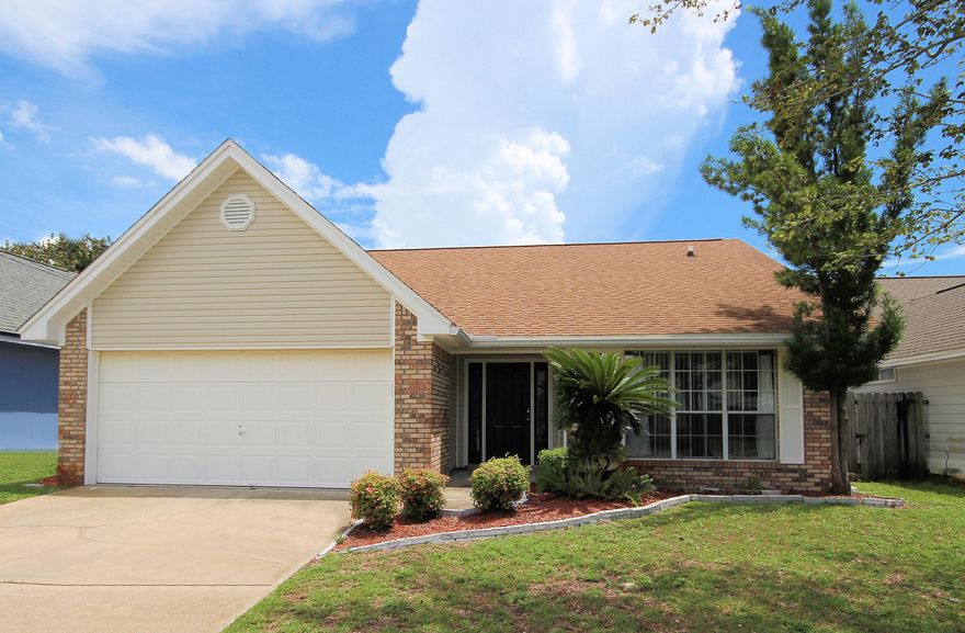 Don't miss this one! Move In Ready and updated throughout! Brick and vinyl home w/ landscaped yard. Updated bathrooms, lighting, flooring, siding, appliances, paint! New laminate wood flooring in living and bonus room, freshly painted interior, bathrooms have new granite counters w/mosaic glass tile back splash and new faucets, lighting and fans updated throughout, siding replaced 2013, newer HVAC, roof 3 yrs. Master bath w/separate shower (new glass door) and garden tub. Walk-in closet in master. Bonus room can be formal dining, office, or play room. Kitchen has separate pantry and a large utility/laundry room. Backyard lined w/mature trees for privacy, decking along back for entertaining, sprinkler system to keep lush. Very close to Hurlburt and Eglin AFB, shopping and beaches.