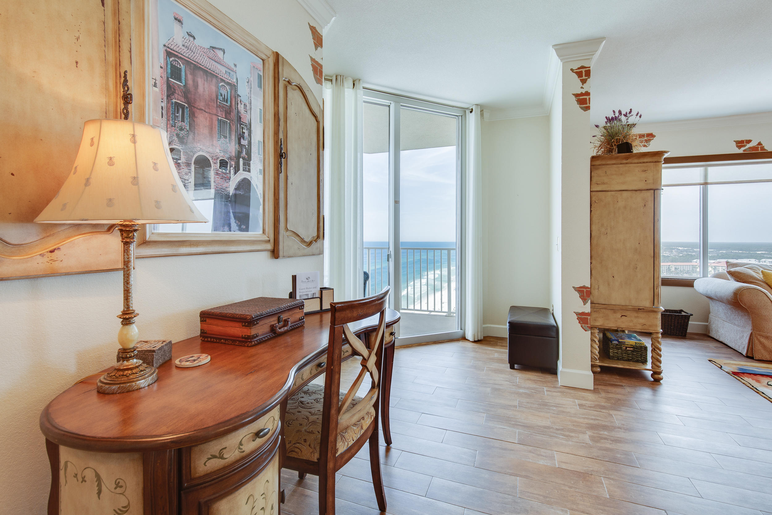 WOW! HURRY! Won't last! Best westerly beach/sunset views in all of Panama City Beach in this spacious and immaculate Tidewater 2000 listing! Far west end unit is decorated to perfection and the large oversized picture windows in LR allow LR, Kitchen, Hall, Foyer with amazing eye popping beach/city/bay views for miles to Santa Rosa Beach! Very well maintained updated unit w/new a/c in 2000, New refrig. 2019, New D/W, HWH in 2018; Tiled LR, Hall, Kitchen, foyer; BRs w/new carpet in 2019; Tuscan themed. Great rental 35K+ likely (owner usage). Tons of amenities; beach, indoor/outdoor pool, fitness ctr, security, theater, game room, owners lounge, sundeck, store, roman spa, covered gated garage, dining on site, mgt. on site and more! Close to PierPark Mall, dining, & all area activities!