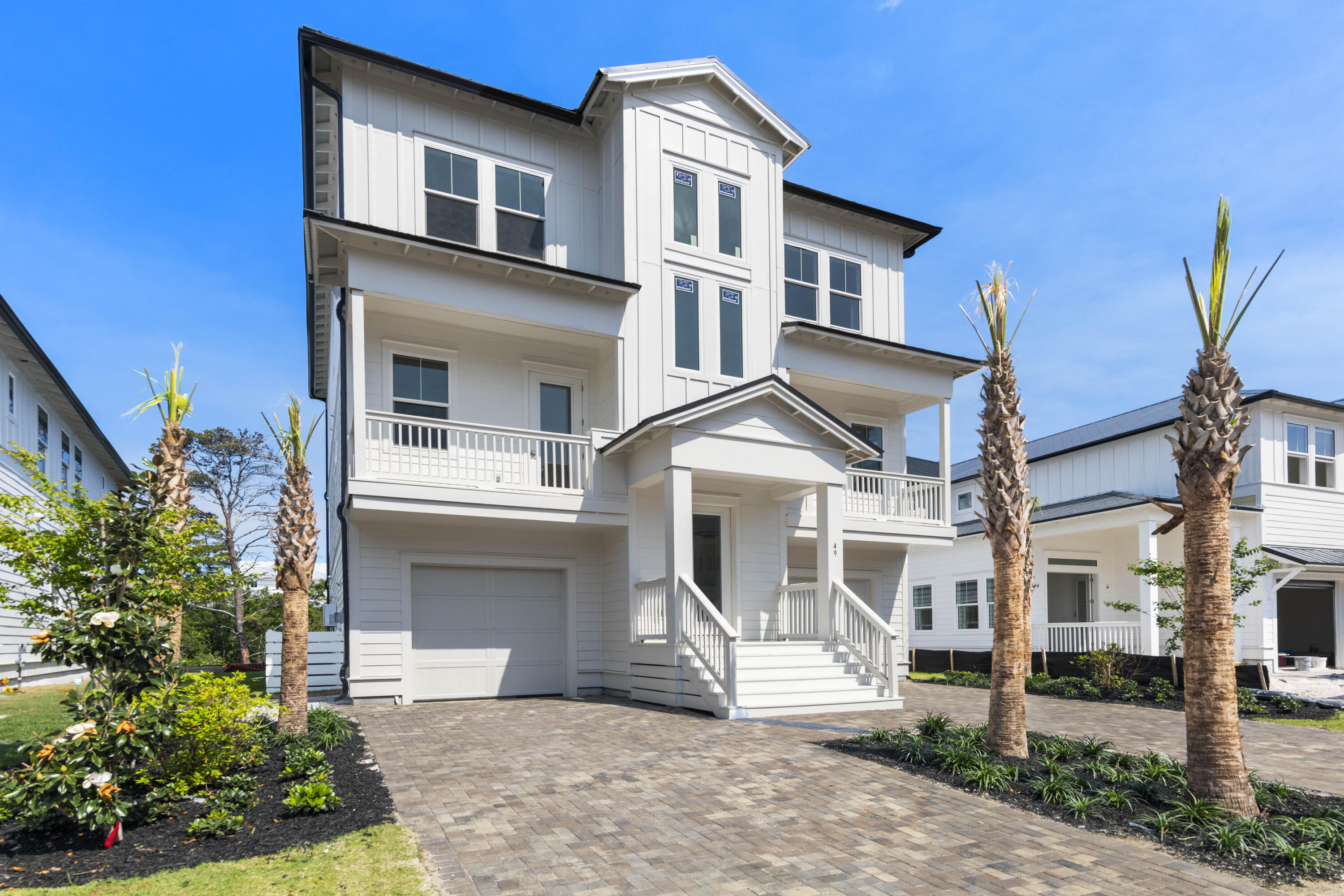 Bluewater Landing is the embodiment of 30A's laid-back and luxurious lifestyle. This intimate 31 home community has easy access to pristine beaches, clear waters, first class dining, and shopping. | Welcome to the CAPE at Bluewater Landing: a contemporary coastal gem for a beach getaway. Boasting nearly 4000 sq ft, this home offers 5 spacious bedrooms, 6 full baths, 2 flexible living spaces, and 2 single-car garages. Enjoy sunshine and views from oversized balconies, and entertain in the open plan living area with an expertly designed kitchen. Privacy and comfort are assured in this perfect home.