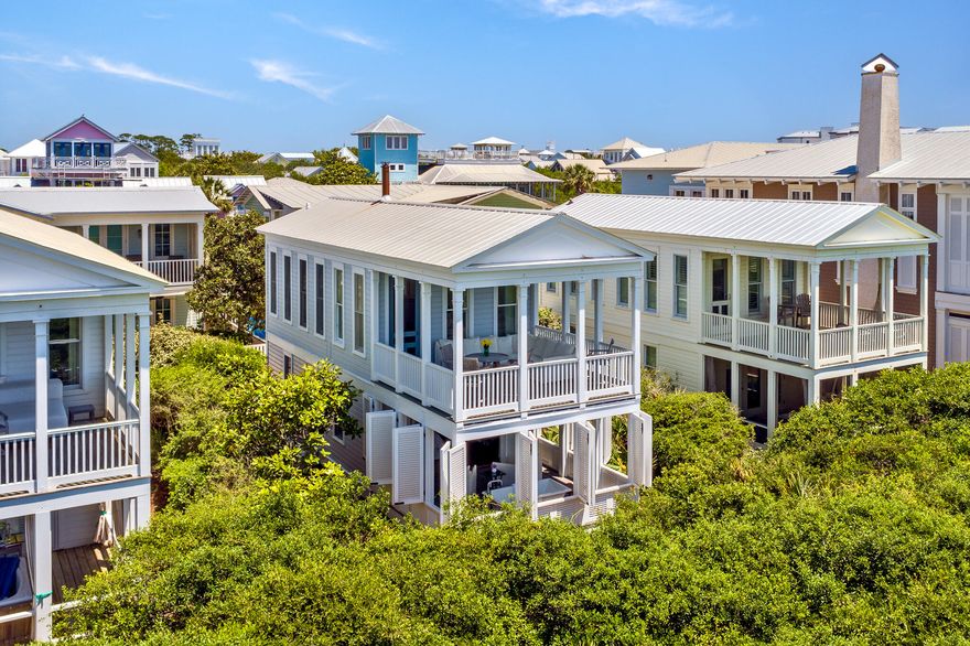A finely crafted bungalow directly on the gulf on Seaside's western side of town. The cottage is perfection without pretension. Simplicity is its essence. The first level redesign of the bedroom and bath includes custom built in cabinets, closets,  tiled shower, washer/dryer, king bed with storage beneath.  The bedroom opens onto a private shuttered porch with an outdoor soaking tub.  Open the shutters to revel a private sanctuary of native oaks with the sound of birds singing.  The stairway winds its way up to the second level where the living room takes full advantage of the fabulous gulf views. Sunlight cascades into the cottage, constantly changing the mood of the room.  The wood burning stove adds ambience to those chilly winter nights. At high noon the turquois gulf shimmers, while