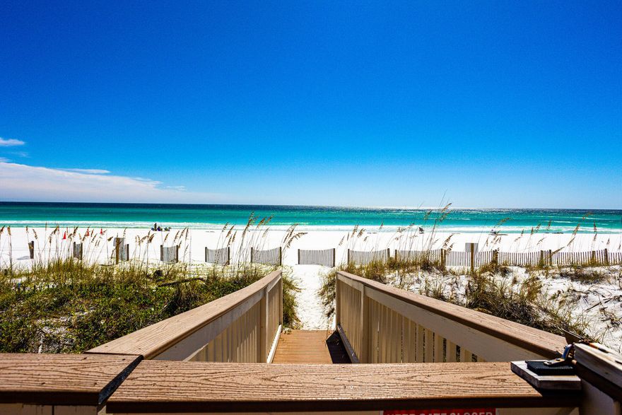 WELCOME to Paradise - This 5 bedroom, 31/2 bath townhome can be a rental machine with gross rental income of $175K - $250K. On the main floor, the kitchen with a breakfast bar opens to a huge living room dining room combination and then out to the 225 sq. foot deck with spectacular gulf views. The top floor has the main bedroom with a sitting area and the main ensuite bathroom. This bedroom has its own private 200 sqft deck overlooking the beautiful water and the sugar white sand. From this deck you can see the coastline from Destin all the way to the Jetties to the west and to Panama City Beach to the east. There is second bedroom with an ensuite bathroom and an additional bunk room.The first floor Beach level was newly renovated. It now boasts a new queen bedroom with amazing gulf ...
