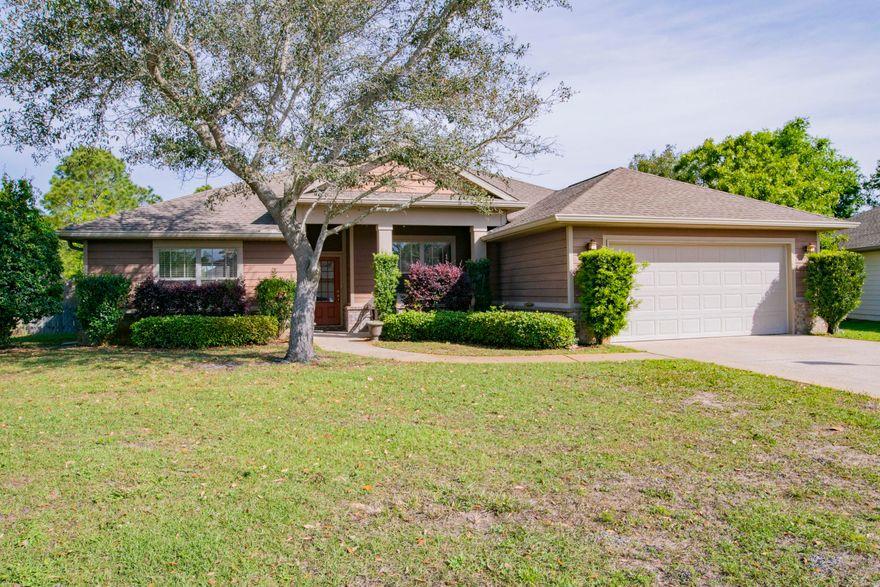 Located in Navarre, this 4 bedroom 2 bathroom home offers an open-split floor plan and vaulted ceilings giving to a nice spacious feel. You'll enjoy two separate dining spaces, a breakfast bar and a pantry. The master suite offers his-and-hers closets, double vanity, water closet, separate shower and garden soaking tub. Enjoy a quiet evening in your fully fenced back yard, with a privacy fence, while relaxing on your pergola. Bonus workshop/yard building with hardiplank siding. Other notables are hurricane coverings, laundry inside, blinds throughout, and hardiplank siding on the house. Just 7 miles to Navarre beach and 16 miles to Hurlburt Field. Don't miss your chance at Florida's living at it's best!