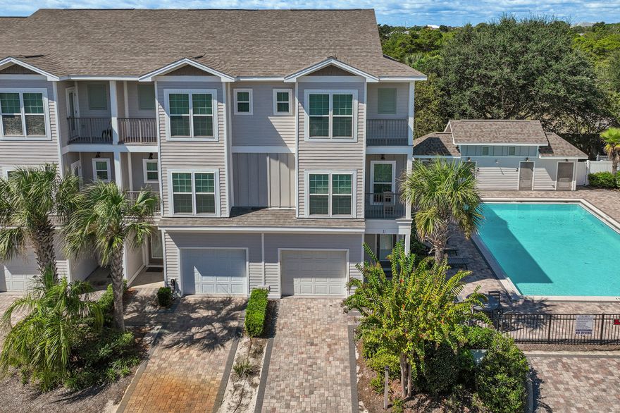 Welcome to 257 Driftwood Road, Unit 11, a stunning three-story townhome nestled in the heart of Miramar Beach, FL. This charming corner unit exudes a cozy and relaxed vibe, offering a comfortable 2,018 square feet of living space with four bedrooms and four bathrooms. As you step inside, you'll be greeted by beautiful oak hardwood floors and crown molding, setting the stage for a welcoming atmosphere. The spacious and airy living area flows seamlessly into the dining room and kitchen, outfitted with sleek stainless steel appliances, including a dishwasher and microwave. Enjoy casual meals or entertain friends in this stylish space.Each bedroom is thoughtfully designed, ensuring ample space and privacy. The master suite is a true retreat with its own ensuite bathroom featuring an oversized shower and a soaking tubperfect for unwinding after a day out by the nearby beach.

The home is equipped with modern essentials like air conditioning, ceiling fans, and a fireplace, ensuring your year-round comfort. A private patio offers an ideal spot for relaxation or evening BBQs.

Additional amenities include an attached garage, laundry facilities, and access to a community pool. This townhome is not just a place to live; it's a lifestyle waiting for you to embrace. Don't miss out on making this inviting space your new home! Sold fully furnished.