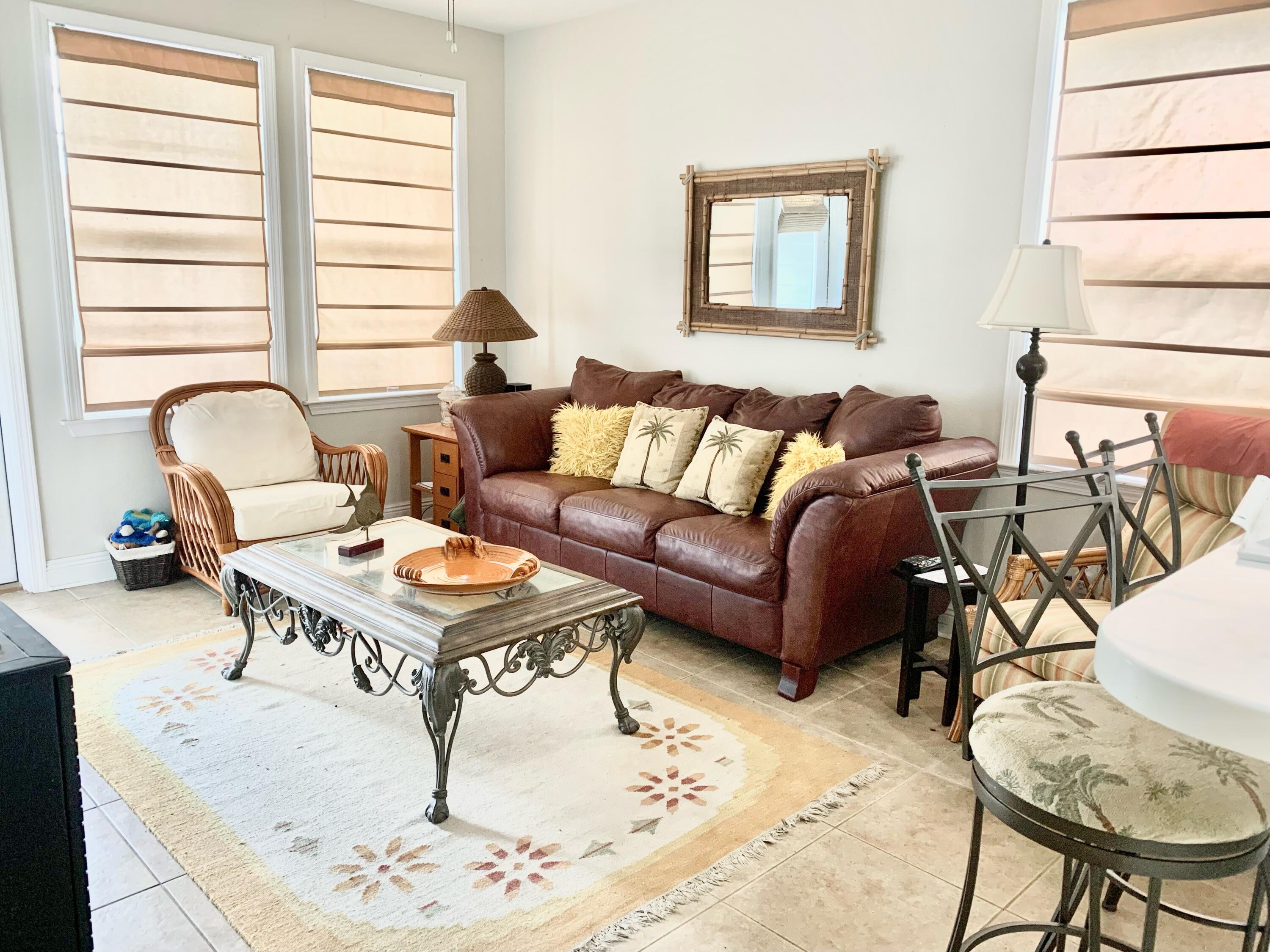 MULTIPLE OFFERS- HIGHEST AND BEST BY 5/16/22 5 PM.Great end unit with 2 bedrooms and 2 baths with direct pool access off the back balcony. Lots of natural light. This unit has not been rented during the sellers ownership. This unit comes with a golf cart and all furnishings. There is golf cart parking just steps away from the condo. The Village complex is a gated subdivision just half a mile (5 min) from the beach access. Beautifully landscaped grounds and a mix of homes and townhomes with great amenities make this complex very desirable. Professional pics next week. Very solid hoa and rental projections between $55-60K.