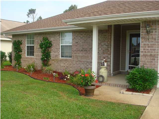 Beautiful home in Parker Place, approx. 8 miles from Hurlburt Field AFB. Sprinkler system w/automatic timer, brick BBQ patio,screened lanai with ceiling fan, privacy fenced back yard and underground utilities! This 4 bedroom, 2 bathroom home features tile floors in all wet areas ( to include dining area), laminate wood floor in entry way, ceiling fans in all bedrooms, upgraded lighting through-out, upgraded bath/sink fixtures in both bathrooms. This is an all electric home. Please, No smoking inside home or garage. Small pet upon approval with conditions.