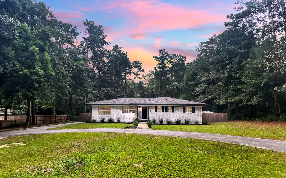 Beautifully renovated ranch home in one of the most sought after neighborhoods in Defuniak Springs! Peaceful country setting that's wooded on three sides for privacy, but only three minutes to shopping and thirty minutes to the beaches of 30A. Neighborhood has fishing pond and a one mile loop that's perfect for dog walking or bike riding. Home has new paint throughout, updated copper wiring, updated light fixtures, granite kitchen counters, new stainless steel refrigerator, faux wood blinds, and fenced in backyard. Just off the living room is a 20x12 flex space that could be used for anything. Home has original hardwood flooring along with newer plank flooring. Oversized lot with circular drive and plenty of parking for any toys. NO HOA! Roof 2018, HVAC 2018, Septic 2019, Well 2020.