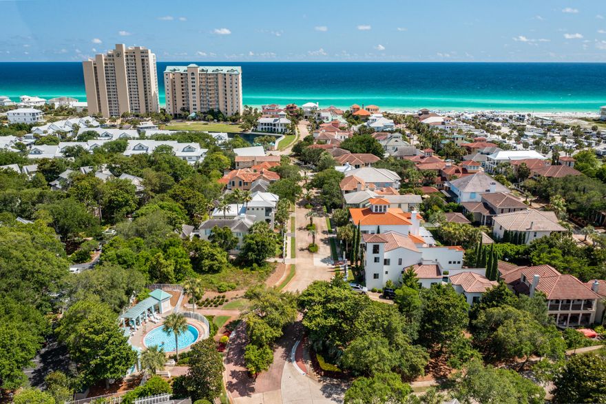 Incredible opportunity to acquire one of the last remaining building sites in Caribe, one of the most sought-after private communities in Miramar Beach. As the most elevated lot in the neighborhood, the future homeowner will enjoy a unique prominence with substantial view opportunities. Situated immediately adjacent to the one of the community swimming pools and just a short walk to the PRIVATE beach, this easy-to-build home site is a tremendous value proposition. With favorable building setbacks accommodating countless home designs and sizes, build the beach retreat of your dreams without compromising your vision. Influenced by luxurious Caribbean design, the prestige of Caribe neither begins nor ends at your home. Entry to the community is gated with monitored security. Common areas are lusciously and meticulously landscaped with mature trees carefully dividing the quiet roads. Tennis courts, community swimming pools and two deeded beach walkovers, all set against a beautiful private beach, make Caribe an amenity-rich oasis. This tropical paradise experiences little to no impact from surrounding amenities yet is mere minutes to them. Venture out to find some of the finest shopping, dining, and entertainment in the area with a quick escape back to your private haven when it's time to relax again. Be it a primary, vacation, or investment property, increased interest in the area, coupled with such a sought-after address, make this a rare and not-to-be missed opportunity to build the home of your dreams.  