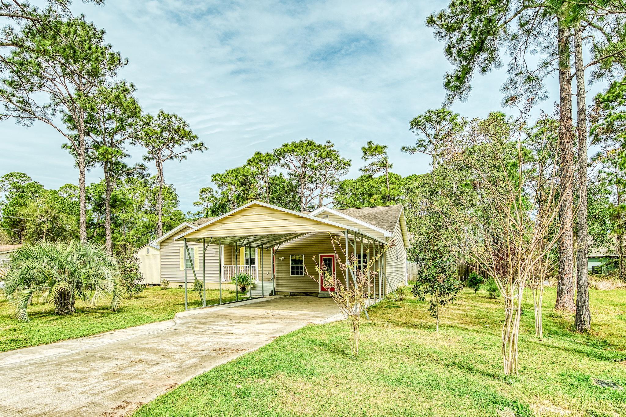 Great 3-bedroom home just minutes from the Bay and the Gulf on an expansive lot totaling 0.32 acres! Newly updated with tile floors, new A/C unit with 10 yr. warranty, granite countertops & stainless appliances in the kitchen, a workshop building & huge screened-in porch. The beautifully landscaped yard offers a serene setting and there are even fruit trees! Great details throughout this home really let it shine. Cathedral ceilings in the living room and master bedroom and tray ceilings in the foyer and dining room add a grand touch. There is plenty of storage with two pantries, an enormous laundry room with walk-in closet, and a bonus room that could be a great Florida room. The master bedroom has an en-suite master bath and a full guest bathroom is convenient for both additional bedrooms The kitchen is beautifully updated and offers a granite breakfast bar perfect for casual dining. There is also an added custom tile backsplash, ample cabinets and stainless appliances. The kitchen opes up to the spacious living & dining area with easy access to the porch. The enormous enclosed back porch is ideal for spending relaxing moments enjoying the peaceful setting and natural wonders of the large backyard, which is filled with Fig trees, Peach trees, Orange trees, and Satsumas. Yet it is still large enough to add a pool if you like! This yard is ideal for the gardener or nature lover and includes a raised planter bed. A large yard building with electrical service is ideal as a workshop, studio, or to store all your outdoor adventure gear.
This home is perfectly located to take advantage of all the Emerald Coast has to offer. Just north of the Gulf and just south of the Bay, simply pick where you want to have a water adventure today. Fantastic location for anyone who loves fishing or a day on the water or beach. Plus there are no HOA fees for this community so no hassle. You can park a boat in the yard if desired.
Conveniently located near Sacred Heart hospital, grocery stores, and Grand Boulevard. Just minutes away from all the upscale shopping, fine dining, and entertainment options of 30-A. The South Walton area is also known for its nature and bike trails, excellent fishing, paddle boarding and kayaking spots.
This home puts you right in the middle of all the Emerald Coast has to offer, at an excellent price and tons of value.