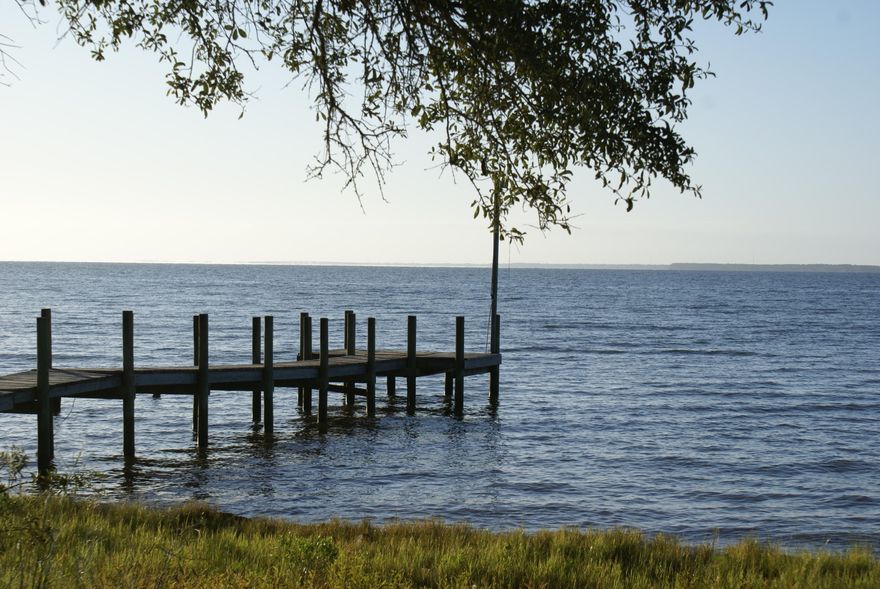 This is approximately 238' of beautiful waterfront on the Choctawhatchee Bay's deepwater. There is a trailer on the property that has no value. There is a deep well on the property. This property does have some wetlands. Building per Walton County DEP says Coastal Zone A8. Verify all information.This property is part of a large tract of land being subdivided into 4 parcels. See other listings