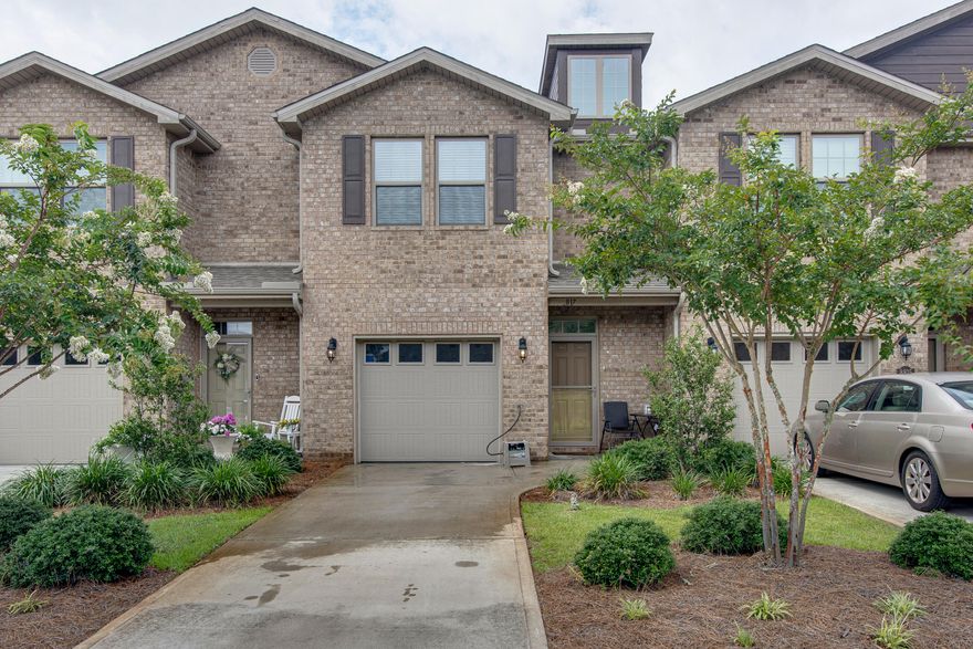 Welcome Home! This beautiful town home is located in a quiet community with access to a pool, park and pavilion! This home features stainless steel appliances, granite counter tops & a breakfast bar area great for entertaining!