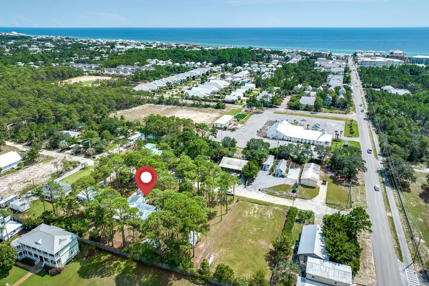 Situated a mere half-mile from the Gulf of Mexico and Ed Waline Park, this property boasts a spacious lot measuring 80x145. Previously owned by a single proprietor, the well-maintained double-wide mobile home features generously sized rooms and a cozy screened-in porch. Upgrades include a new roof in 2021 and an A/C system replaced in 2011. The mobile home, along with essential utilities like the water tap,  and septic tank is located on Lot 4. Additionally, a vast concrete driveway can comfortably park up to 6 vehicles. Located on a private, no-through road. Enjoy the freedom of no HOA fees, deed restrictions or covenants. Plus, the beach is just a short half-mile golf cart ride away.