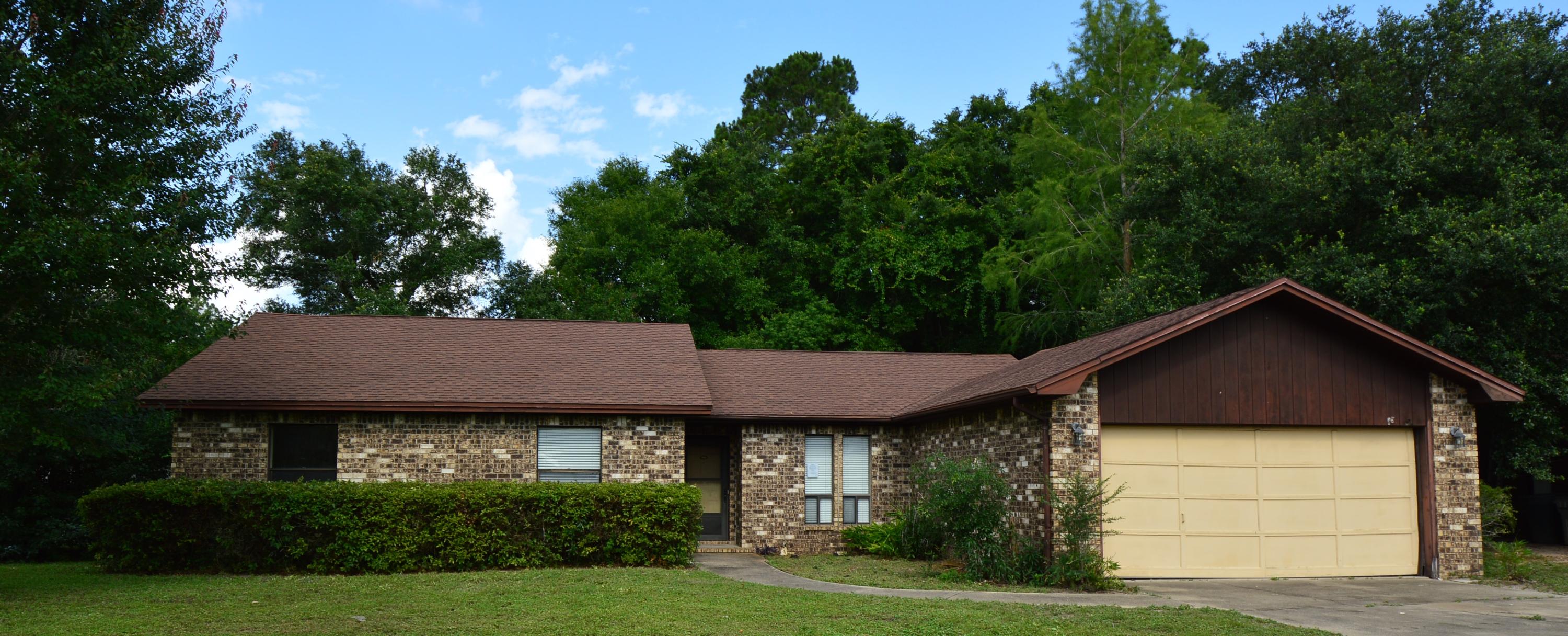New Price! Great opportunity on an REO property! Great starter home with all brick exterior. New Garage Door; New HVAC; New neutral Carpet throughout; New neutral paint; New SS kitchen appliances; 3 bedrooms; 2 Full baths; Master Bedroom with dressing area; 2 walk-in closets and built in dresser; Screened porch off eat-in kitchen; Wood burning Fireplace in Family Room; Vaulted Ceiling in Family Room; 2-Car Garage w/new Door; Fenced back yard. Large 1/4 acre lot. Cul-de-sac location.