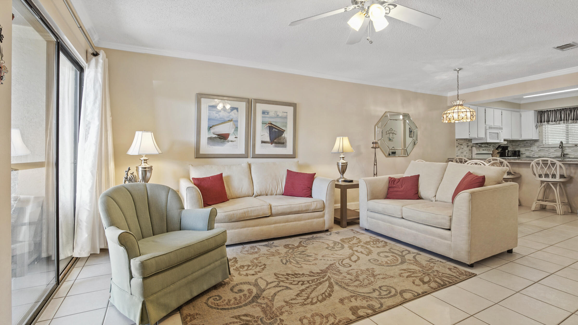 CURRENTLY UNDER CONTRACT - SELLER ACCEPTING BACKUP OFFERS. Check out this great 2BD/1.5BA townhouse that is turn-key ready for your investment property with rental projections of $32k-$41k or it'll make a great 2nd home! Open concept living room/dining/kitchen. Kitchen has granite with a beautiful tile backsplash. 1/2 bath and laundry with full sized washer/dryer finish out the main level. Upstairs you will enjoy the deck off the primary bedroom with another good sized bedroom for guests and a full bath. No carpet - tile on main and vinyl plank up. There's a storage shed right by the front door for your beach items and it's a short walk to public beach access #71! Portside amenities include 3 pools, one heated, a kiddy pool, a spa (hot tub), tennis courts, shuffle board and an owners'