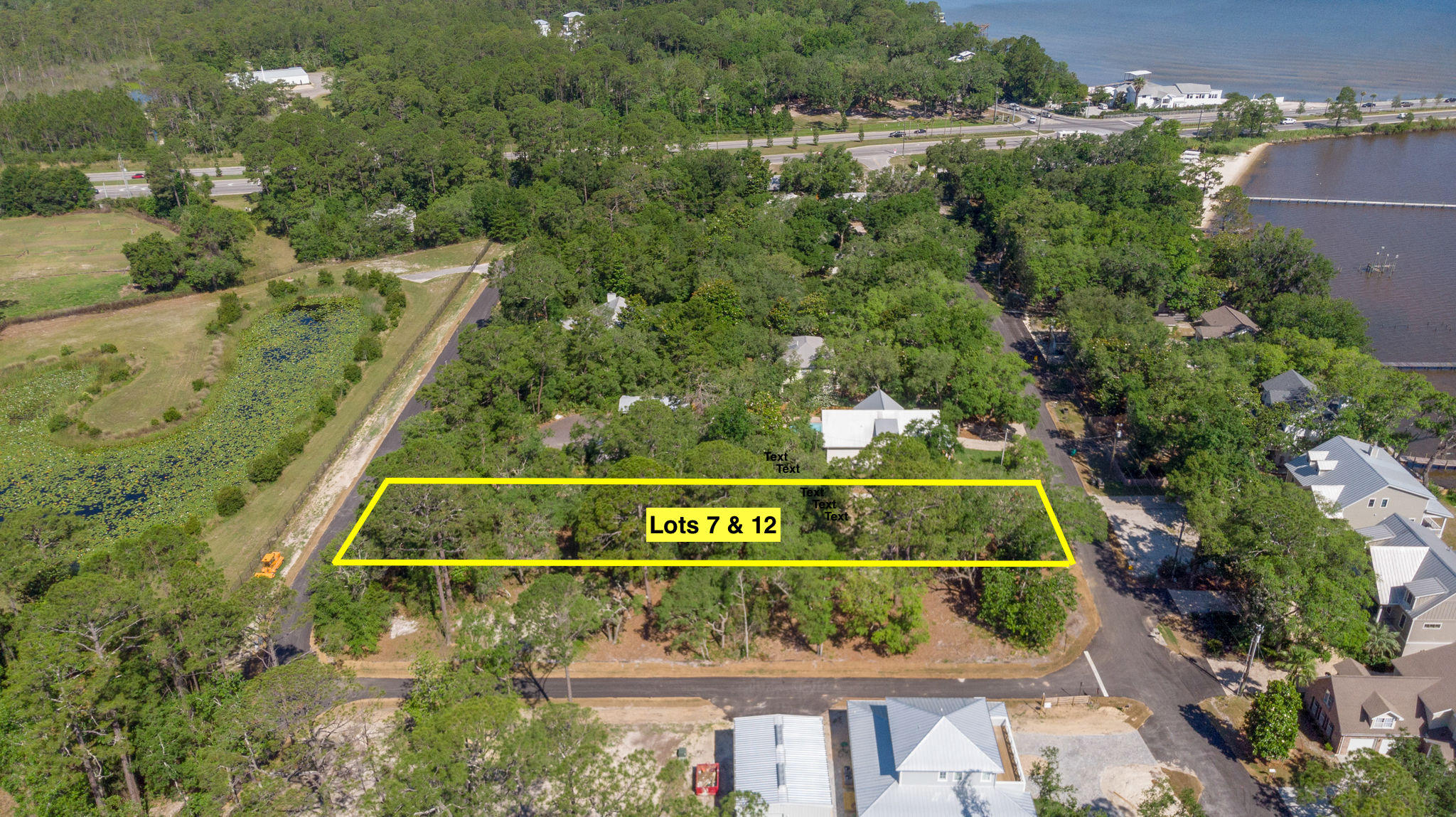 Beautiful half acre lot to build your dream home with bay views. Quiet neighborhood with easy access along Hwy 98 and north on Hwy 331. Plenty of room for a large home and a pool or carriage house. Thomas Pilcher Park just 3/4 of a mile from property for public boat launch, public parking, fishing, and picnicking. Close to restaurants, beaches, shopping and more. Beautiful oaks and magnolias adorn the parcel. A must see, a must have! No Homeowner Association Fees!