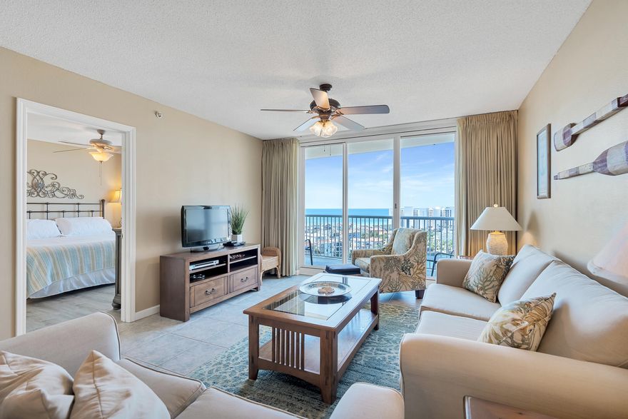 This spacious two bedroom, two bath condo has INCREDIBLE VIEWS. PROJECTED INCOME $50,000! The oversized balcony allows plenty of outdoor seating to enjoy the sunsets or weekly seasonal firework shows. And did you know it's only a 1minute stroll on the boardwalk to get to the private beach? That's right! This condo features the living area & master bedroom with balcony access,  Nice size kitchen with a breakfast bar PLUS The flooring is  ALL TILE and LUXURY LVP   - NO CARPET. It comes FULLY FURNISHED and other features include a stackable washer & dryer,  nice size pantry and owner's closet.The Terrace is located in one of the most popular vacation complexes on the Emerald Coast. Terrace at Pelican has their own pool and and grill area, and owners and guests at Terrace have unlimited use to all of Pelican Beach amenities including three pools (indoor & outdoor), an indoor sauna & steam room, gym,tennis, covered parking, conference rooms, game room, caf??, tiki bar, & beach service. The new 114 ft zero entry pool right on the beach with 12 seat spa is absolutely making this resort the optimum vacation destination. This condo makes it a great investment, second home or primary residence. 