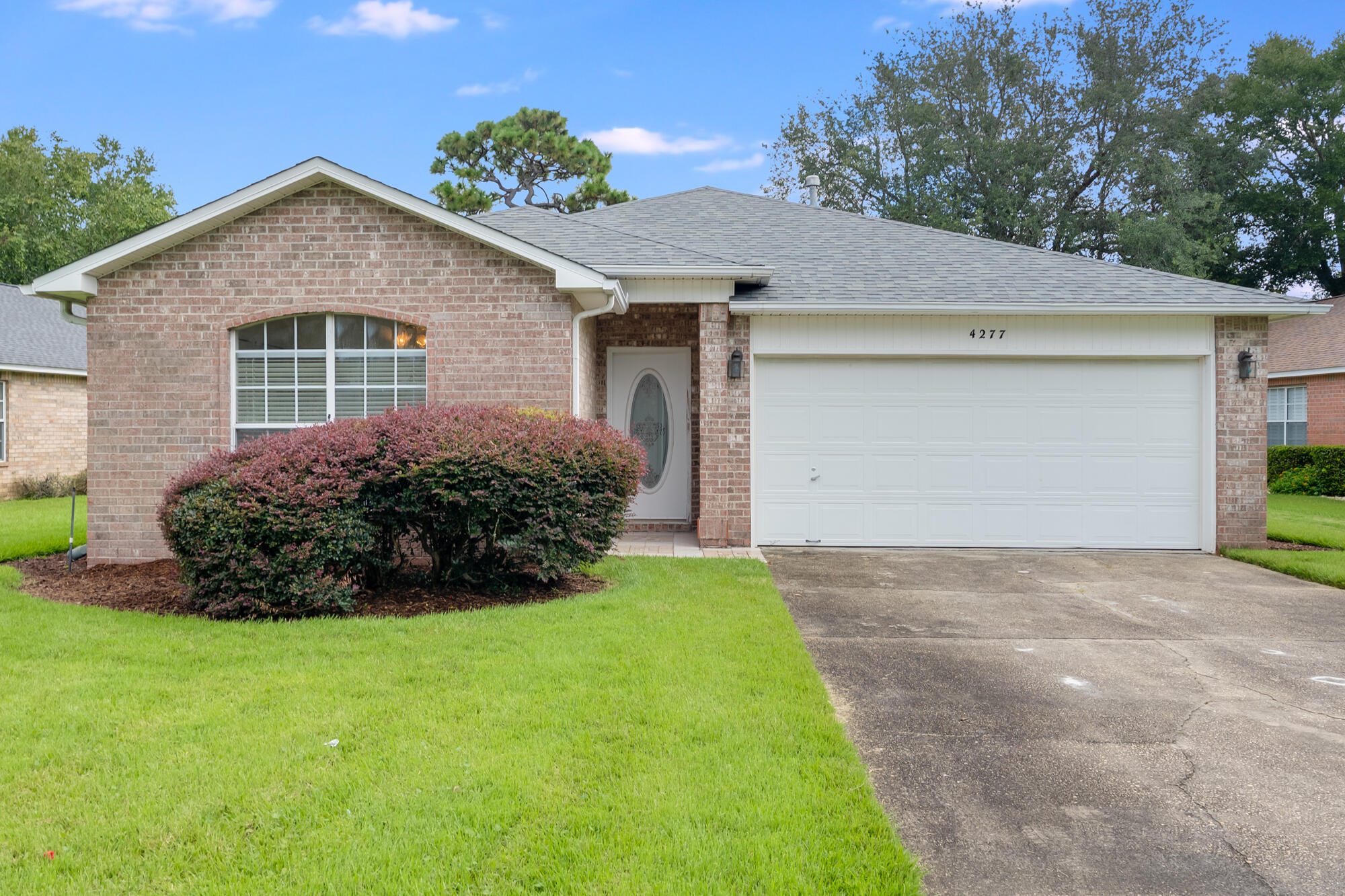 Designed for easy living, this all-brick home offers a welcoming layout, fresh updates, and the security of Niceville's gated Magnolia Plantation.An airy, open layout connects the kitchen featuring crowned cabinets, a center island, and walk-in pantry to a vaulted living area with a gas fireplace. From there, step into the heated/cooled Florida room or adjacent screened porch, both offering year-round enjoyment.Recent updates include fresh interior paint, new carpet, and professional deep cleaning, making this home truly move-in ready. Combining comfort and function, it's a rare find in one of Niceville's most sought-after communities.