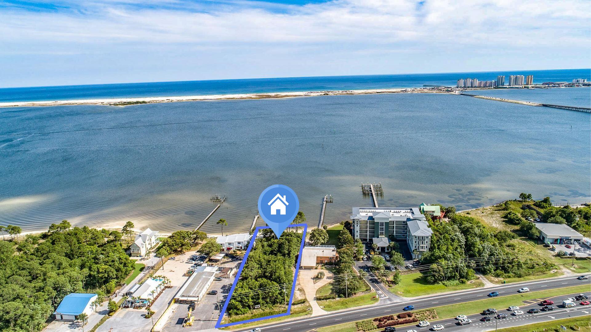 Great piece of buildable waterfront land south of Highway 98 in Navarre. Can be used for commercial or residential. Has 99 feet of shoreline.