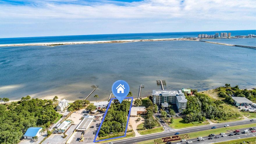Great piece of buildable waterfront land south of Highway 98 in Navarre. Can be used for commercial or residential.  Has 99 feet of shoreline.