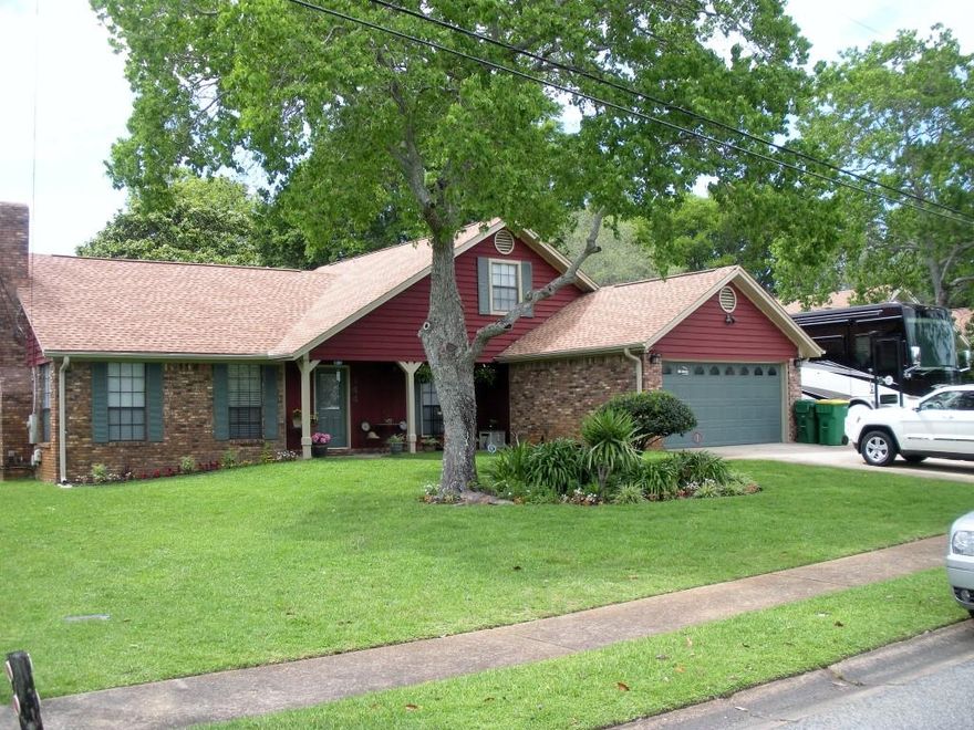 Immaculate mostly brick 4 bed / 3 bath executive home w/ sidewalks, city maintained community park, & NO HOA FEES! Home is in town & has tons of upgrades; mostly in 2015-6! A new dimensional shingled roof w 25 yr warranty, was added in '16, & 13 SEER HVAC upgraded in '07. Owner added new solid oak cabinets, counters, & tile floors! Also remodeled the living & dining rooms by removing walls, upgrading the electrical on two walls, and extending support beams to open it up more, which added 100 sq ft of heated and cooled space (building plans show the expansion). They also added an incredible treyed ceiling with chandelier in the dining room! High end and pricey custom fabric blinds were installed throughout the home! Please click on ''More'' for additional information about this awesome home