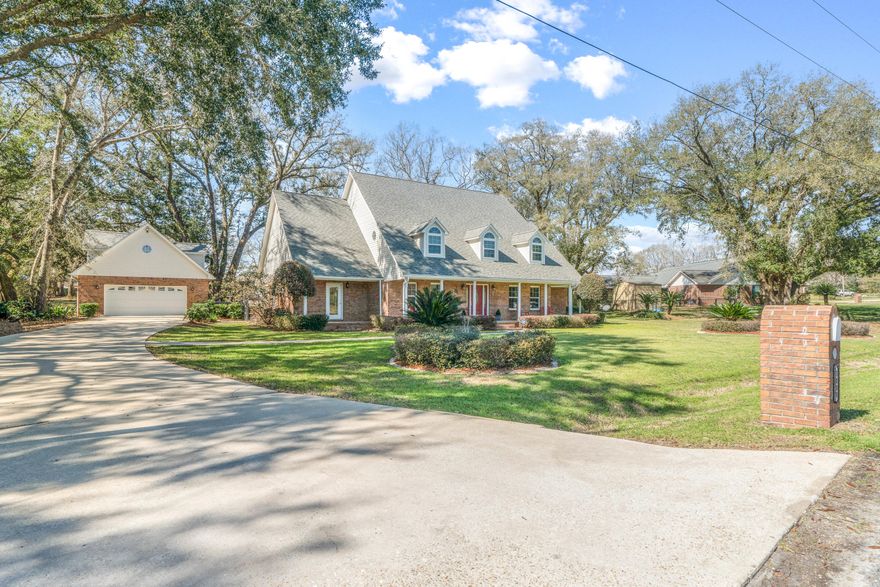 Pristinely-kept Charming Estate in North Crestview, near the newest shopping plazas in quiet neighborhood with pond views. This 5 bed, 4 bath home sits atop a 1 acre boasting established magnolias, azealas, roses and lillies. Upon entering amidst the column flanked porch, the winding staircase carries your eyes upwards to this grand home. Kitchen boasts beveled granite countertops, stainless appliances and window overlooking the sink. Spacious master suite has walk-in shower and soaking tub, along with his/her sinks. Each bedroom in this home has an attached bathroom, including a jack/jill style between two of the bedrooms. Main living area has fireplace with french doors overlooking brick paved outdoor entertaining space with gas grill hookup. See additional description details*