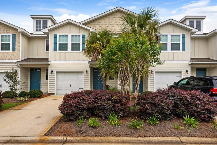 Must see immaculately maintained townhome in the highly sought after community of Water Oaks! Only minutes to the beach and attractions of 30A, this centrally located property will not last long. On the main living level you are greeted by wood floors leading to the open concept kitchen, living and dining combo that is perfect for entertaining. The second level features a master bedroom ensuite with a walk-in tiled shower and double vanities. There are also 2 guest bedrooms, a guest bathroom and laundry area on the second level. Other features include a single stall garage with plenty of storage and a back porch landing overlooking the green area that is the perfect place to relax and get away from it all. This townhome is a must see so call today for your private showing before it's gone!