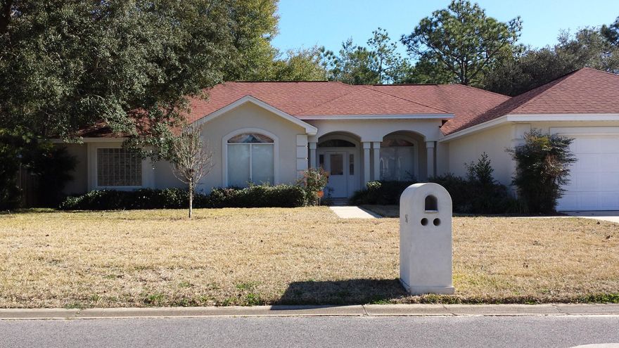 This lovely stucco home is located in the Longwood Pines subdivision, on a 110x115 ft. lot which backs to a wooded area. The heated and cooled Florida room opens to a fenced back yard with a hot tub. The side yard features a large RV pad with adjacent hookups to the house. An inviting floor plan offers 2 living areas, one with a fireplace, a formal dining room, large kitchen with a breakfast nook, opening to the Florida room. All blinds and window treatments are included. Split floor plan offers 3 bedrooms and 3 bathrooms. Laundry room leads to a 2 car garage equipped with a garage door opener and pull down stairs with decking in attic. There is a central vac system and the home has never been smoked in. Home has a security system, ceiling fans in all rooms, and trayed ceiling with