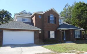 Amazing 5 bedroom 3 bath home located in the gated community of Parkwood Estates. This HomePath by Fannie Mae property has been freshly painted, new carpet, new bamboo flooring in the kitchen area, 2 new HVAC's, new front door, new French doors, and the list goes on. Living room offers tile floors, new ceiling fan and wood burning fireplace for the chilly winter nights, and French doors that lead out to cover patio. Kitchen has new bamboo flooring, double sink that looks out into the back yard, gas stove, island and counter space galore. Upstairs 2 bedrooms offer access to the balcony, large master bedroom, master bathroom offer spate shower, double vanity and garden tub. Call today for your private showing.