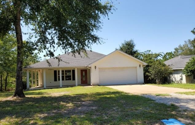 Real Estate Owned REO. Buy and hold for future investment in the fastest growing county in Florida. Enjoy soaking in the garden tub, or cozy up to the fireplace during cool fall evenings, the wrap around porch extends to the large back deck perfect for entertaining friends and cooking out at the large open back deck. You're sure to enjoy the peace and quiet this location has to offer. Located less than six miles from the Mossy Head school, the golf course on highway 90 and Mossy Head Park. Enjoy the lower county property taxes as well.This property may qualify for Seller Financing (Vendee) call to take a look at 639 Brookside Dr today.