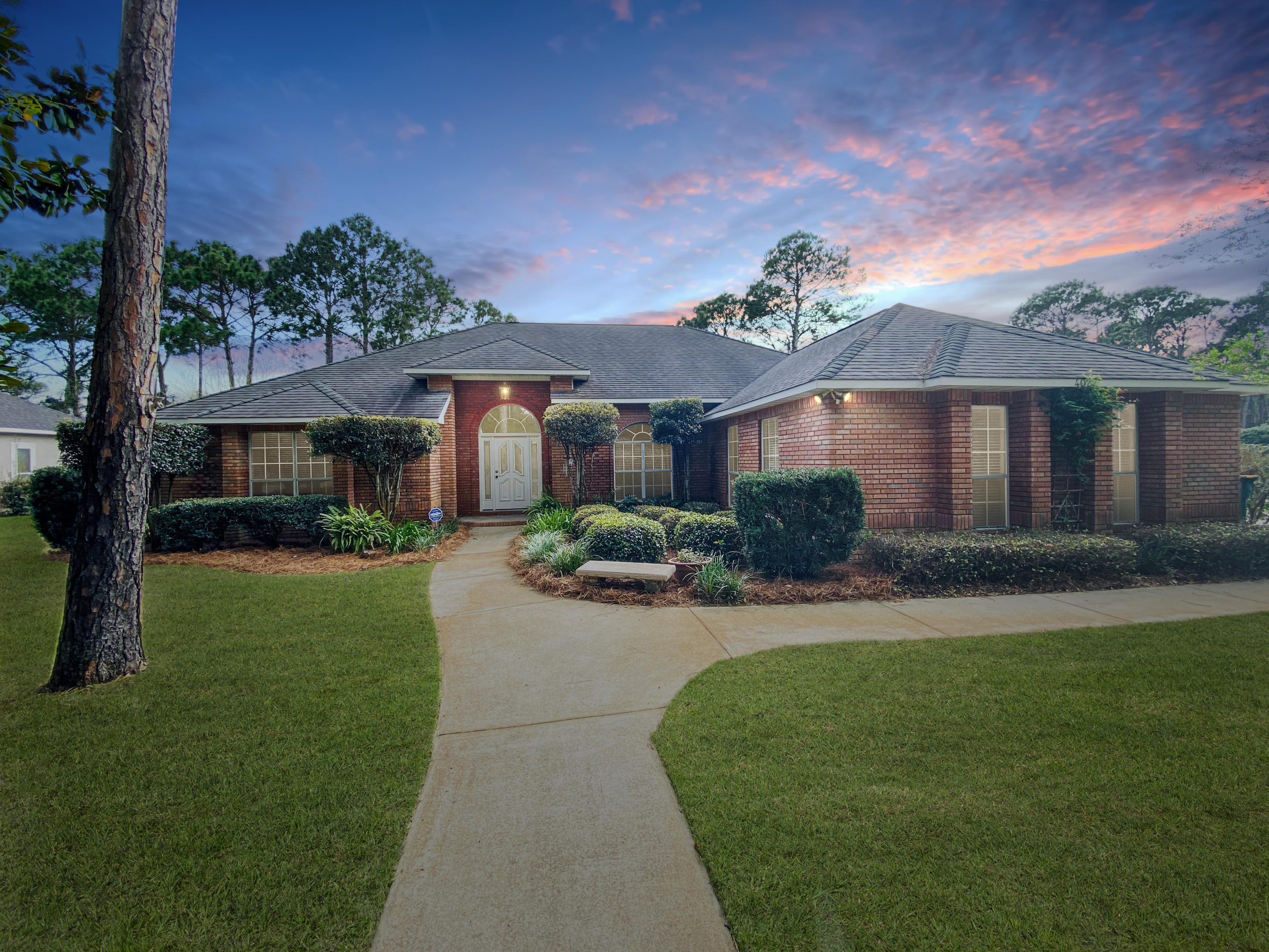 ***Now with brand new stainless steel appliances.*** This home is located in one of the most desirable areas in all of Destin. This 3 bedroom, 2.5 bath brick home is close to everything in Destin. Just across the street lies Choctawhatchee Bay. Enjoy a large pool with spa/jacuzzi that's screened in with plenty of patio space to entertain. Need storage? The back yard contains a 10x16 storage/workshop shed. A large master bedroom with en suite bathroom highlights this home and the other two bedrooms have enough space for a queen size bed. The kitchen has lots of cabinets and counter space and a breakfast nook overlooking the pool. There is only a washing machine in the house...no dryer.