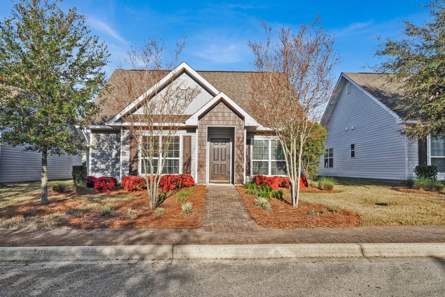 Nestled in the Hammock Bay community of Schooner Landing, this charming 3-bedroom, 2-bathroom home welcomes you with its spacious open-concept living area flooded with natural light. A split floor plan with large Master Bedroom and two additional bedrooms.  The master bathroom has a luxurious garden tub, separate shower, double vanity, and linen closet for added convenience. Step outside to enjoy the patio, and conveniently park your vehicles in the two-car garage. Situated just a short walk from the heart of Hammock Bay, this home offers easy access to a vibrant community hub. Enjoy a calendar full of activities at the green, the resort-style pools, multiple lighted pickleball and tennis courts, lap pool, clubhouse, and fitness center--all conveniently included in your monthly HOA..