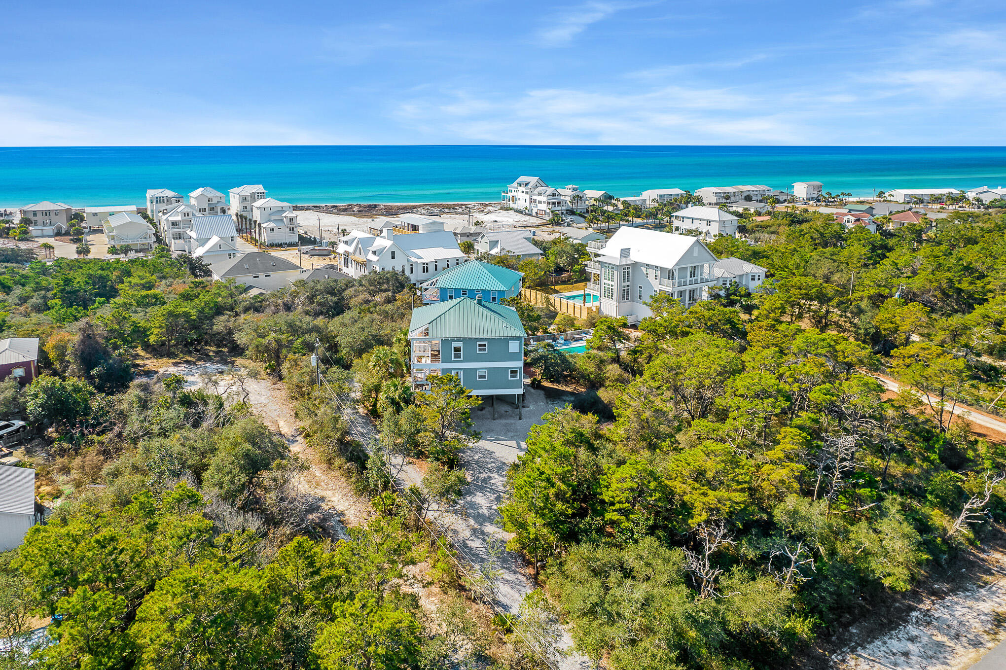 Rare opportunity to purchase a large tract in the hottest area of Inlet Beach with two great homes! Homes are solid and can easily be renovated to achieve a fresh, stylish, beach residence. Homes are on pilings with huge decks allowing for easy expansion. With Gulf and Camp Helen views from 20 feet this opportunity will not last long