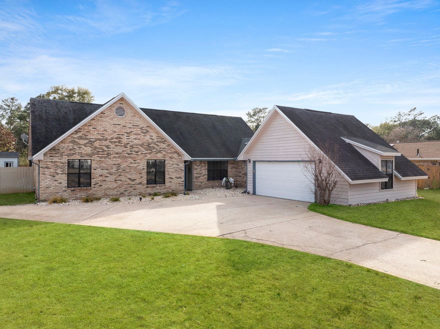 Wonderful home in Raintree Estates with a pool.