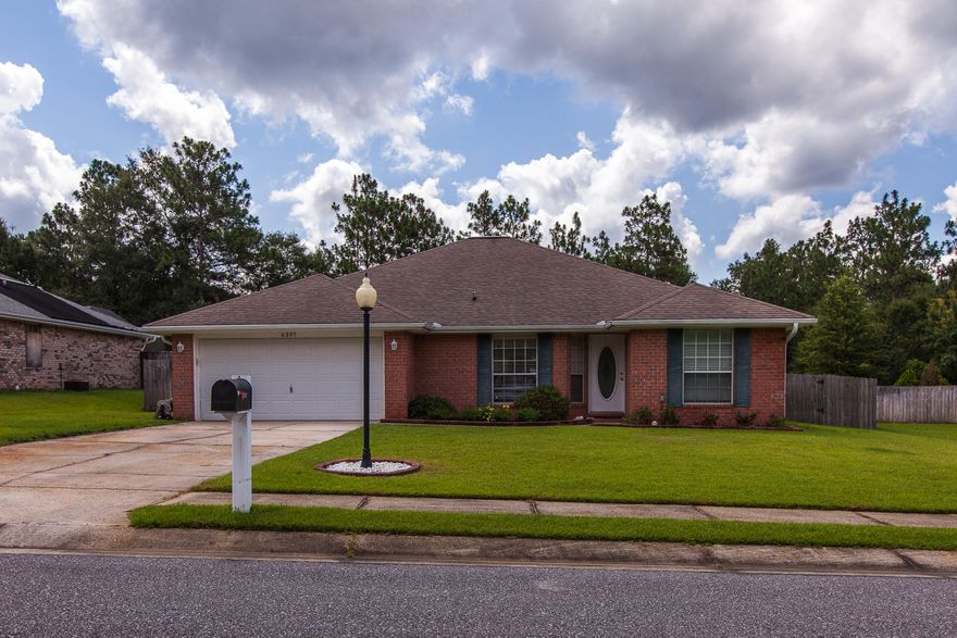This all-brick, 4 bed/2 bath home, is in a fantastic neighborhood that features a community pool, playground, & sidewalks throughout! Sitting on nearly a 1/2 acre you're nestled on a quiet cul-de-sac and centrally located to stores, restaurants, & theater. The open main living area has NEW wood-look flooring, a fireplace, & vaulted ceilings-the perfect space to entertain. Kitchen features a gas stove, newer refrigerator & dishwasher, center island & breakfast bar! A split floor plan allows for a private master bedroom w/two walk-in closets & dual vanity! Make your way to the backyard and enjoy the Florida weather year round w/the screened-in porch! Fenced backyard w/greenbelt-no neighbors behind, sprinkler system, & already has gutters. Schedule to see this move-in ready home today!