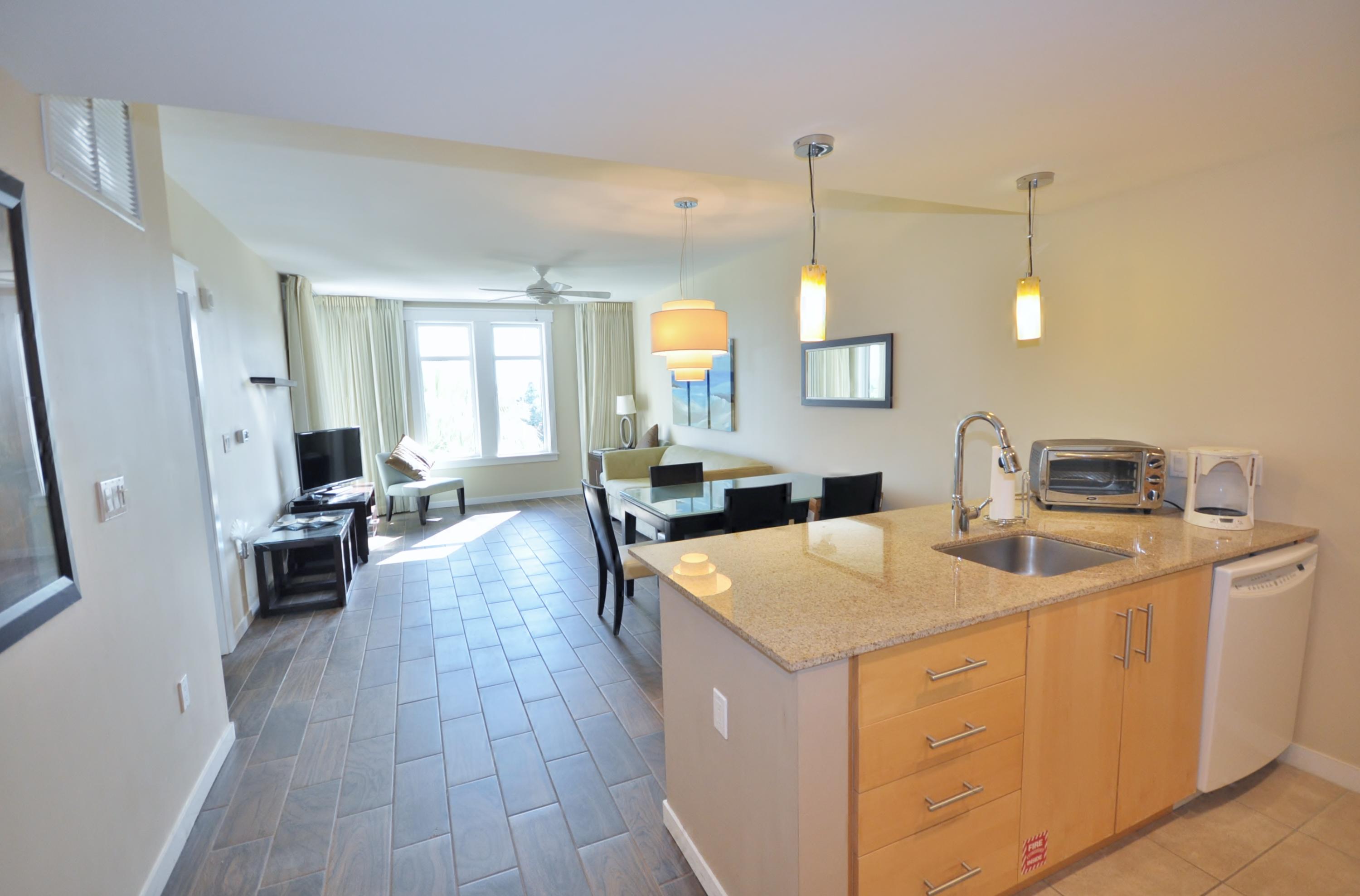 Enjoy tranquil views of the Grand Gardens and resort style pool from the private balcony. Interior features include wood look plank tile throughout living and dining area, granite countertops, king size bed, double vanities in the master bath, and washer/dryer. Elation owners have access to the private Solstice Club, an amenity for owners and their guests, featuring clubhouse with bar, flat screen TV, bar & gas fireplace, screened porch, and an expansive deck overlooking the bay.
