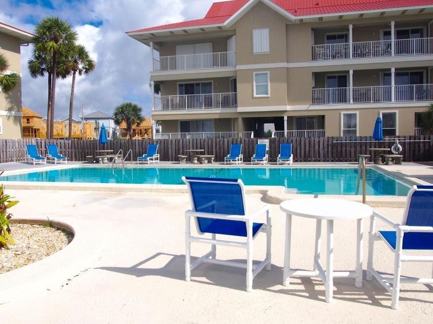 Beautifully Remodeled FIRST FLOOR Studio Unit - Walk right outside and enjoy the nature and outdoors ** Steps from the POOL ** No Stairs or Elevators Needed! Kitchen Features Newer Corian counter tops complete with breakfast bar and counter stools ** Newer custom Hickory cabinets and appliances ** Full sized fridge and oven ** Hood vented microwave ** Compact dishwasher ** The entire unit has Tile throughout ** King Sized Bed with Drawers Underneath for Extra Storage ** Unit has Updated Wiring and Lighting ** Wireless internet available ** Freshly Painted, Turn Key Ready to Occupy or Rental Investment. Nice patio for entertaining. Sound front complex offers beach area, private fishing pier, pool, communal coin-op laundry, and gazebo/ picnic area with grills. Just a short walk across street