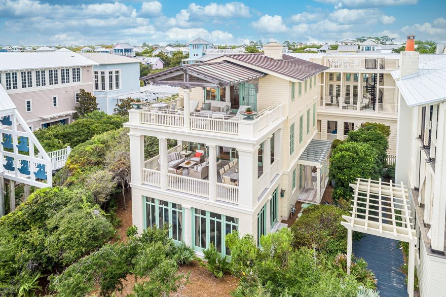 This exclusive residence has been the cover story for several publications including Architectural Digest, Coastal Living, The Coastal Cottage, 30A Style and more. Featured on Oprah.com as one of the 7 Prettiest Summer Porches (2017). ''Everything about this privately owned cottage emotes a singular impression...Style. There are front porches on all three levels with the view more encompassing than the one below. These amazing views of the gulf compliment the generous living spaces and four bedrooms, three on the first floor and the master suite on the third level. The first floor's expansive porch features two sumptuous bed swings with plenty of seating to relax and listen to the gulf breezes. On the second floor the house opens up and outward from the kitchen, dining and living areas in
