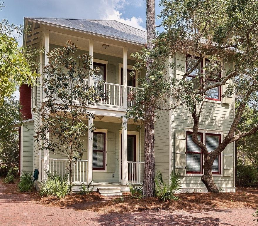 WELCOME HOME to your beautiful oasis nestled in the secluded forest like setting of The Hammocks. Step onto warm wood floors featured in the halls and living/dining/kitchen. Granite countertops with sleek cabinets and stainless appliances make cooking and entertaining a dream. Inviting fireplace for those chilly winter evenings. Luscious outdoor space overlooking natural wooded area and one of 2 community pools. (Recently remodeled.) Newly renovated addition to living area, bathrooms, new carpet, new kitchen stove make this home seem brand new. Just a short walk or bike ride to the Emerald waters and sugar white sands and all the fun, entertainment, restaurants, shopping at Seaside and WaterColor. This community has only 45 lots and a community kayak launch that lead into Western Lake