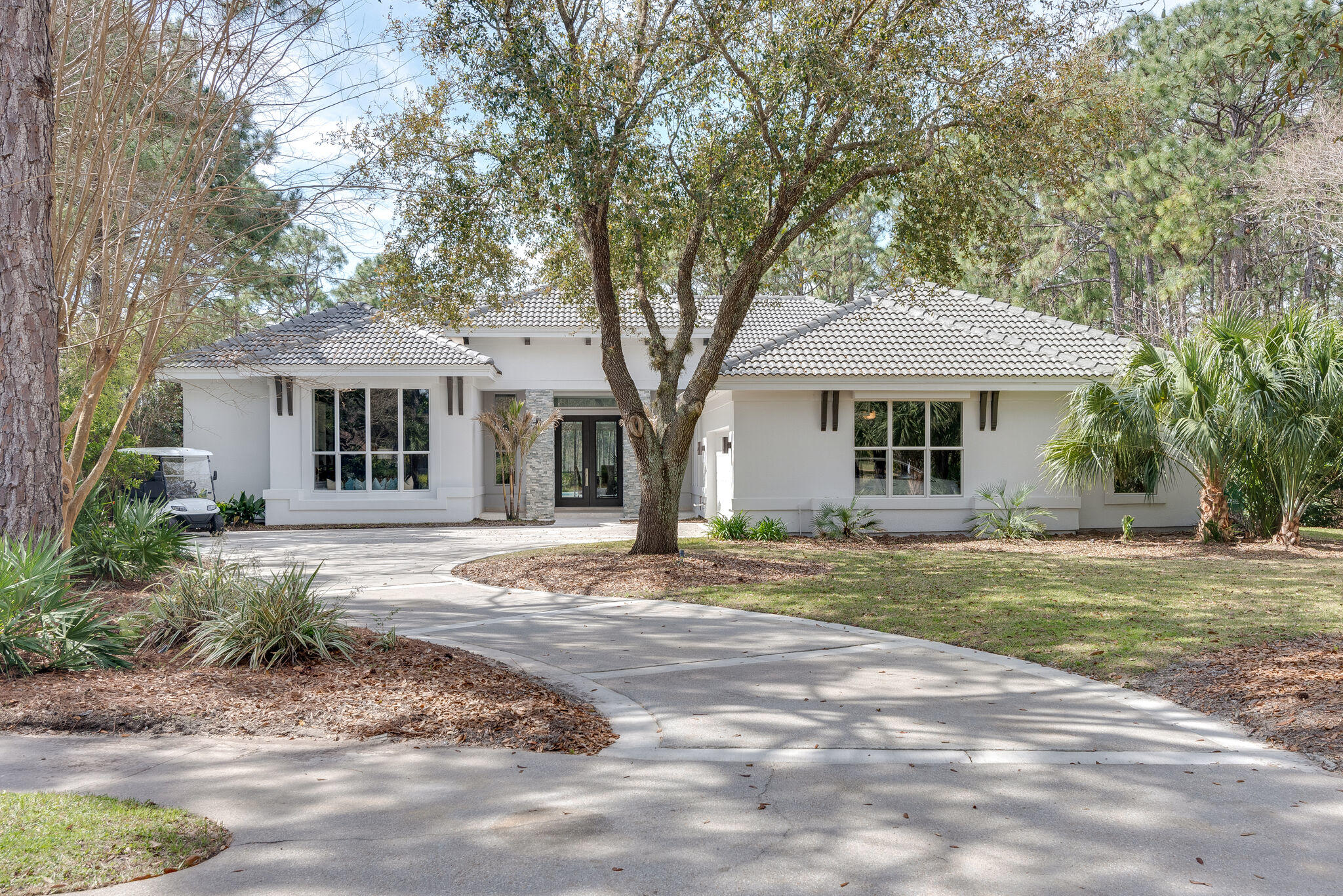 Magnificent 4 Bedroom 4 Bath home plus office in Kelly Plantation. This home is nestled on .55 acres that backs up to the preserve with ample privacy and views of Toms Bayou. This is truly one-of-a-kind property! The sellers have upgraded this home with many high-end finishes - As you walk through the door you notice the architecturally distinct stone columns and accent stone walls. This spacious split bedroom floor plan offers two large living areas both with many newly remodeled features. Renovations included addition of both interior and exterior living spaces. Both living areas have stacked sliding glass doors that offers extensive outdoor views of the pool and nature preserve. Kitchen features custom high end quartzite waterfall island,