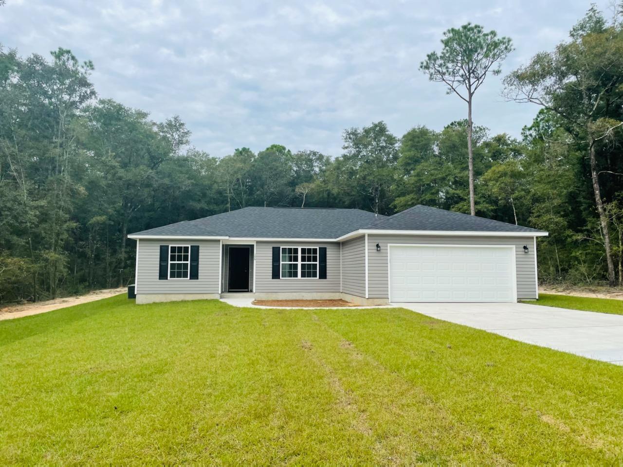 THIS NEW CUSTOM BUILT HOME HAS ALL THAT YOU ARE LOOKING FOR IN A HOME. 4 BEDROOMS 2 BATH SPLIT FLOOR PLAN WITH ALL THE EXTRAS. HOME WELCOMES YOU WITH A LARGE FOYER INTO THE LIVING ROOM THAT IS PERFECT FOR FAMILY AND GUEST ALIKE. KITCHEN HAS AMAZING CABINETS WITH PLENTY OF SPACE AND IS ATTACHED TO THE DINING ROOM. MASTER SUITE OFFERS A LARGE BEDROOM WITH TREY CEILINGS, A GREAT MASTER BATH TO INCLUDE A HUGE WALK IN CLOSET. THE 3 ADDITIONAL BEDROOMS ARE PERFECT FOR YOUR FAMILY. HOME HAS CUSTOM CABINETS, LUXURY UPGRADED VINYL PLANK FLOORS, TOP GRADE APPLIANCES MINUS A REFRIGERATOR, OPEN CONCEPT AND LOCATED JUST MINUTES TO JUNIPER LAKE BOAT LAUNCH GREAT BUY IN THIS MARKET! SELLER WILL PAY 4% IN CLOSING