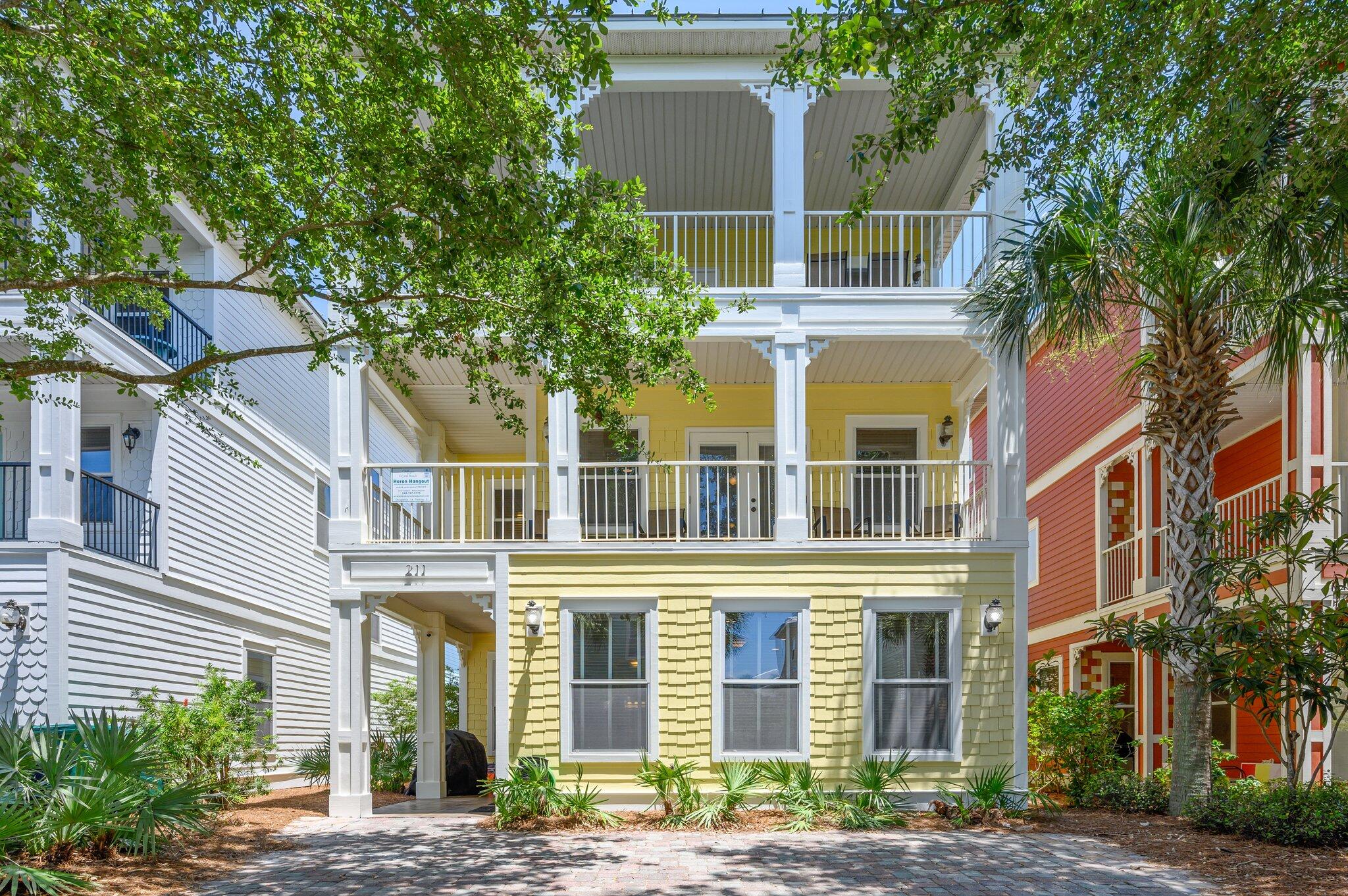 NOW is the time to secure 'Heron Hangout', a proven rental machine with projected gross income of $148,000+ and the BEST VALUE in Villages of Crystal Beach, Destin's ever-popular, gated community. Perfectly located just one house back from the amazing lagoon-style community pool complex, this 5-bedroom, 4-bath property sleeps 14+ guests in style and comfort! The spacious, entertainment-friendly layout features an open concept main floor living/dining/kitchen space as well as nicely-appointed kitchenettes on both the second and third levels. Enjoy upscale finishes like travertine flooring, granite counters, crown molding, and stainless steel appliances as well as recent improvements including full exterior and interior paint, expanded parking pad, new microwave, newer refrigerator and range