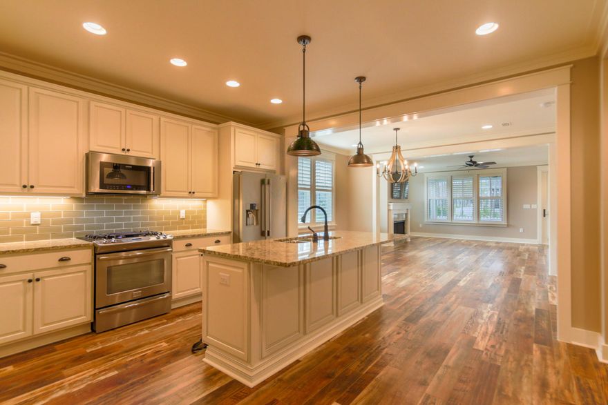 This stunning one story, Begonia plan, offering outdoor living spaces, is located in beautiful WaterSound Origins. The spacious kitchen showcases the Professional Frigidaire Series stainless steel appliances, stainless steel vent hood walk-in pantry, center island all that flows easily into the large dining room. The living room, which opens to the back porch, beckons family and visitors to enjoy gatherings both inside and out. Other features include; V-Groove walls in the living, kitchen and dining areas, large bedrooms each with their own walk-in closet, over-sized laundry room and 9' ceilings.