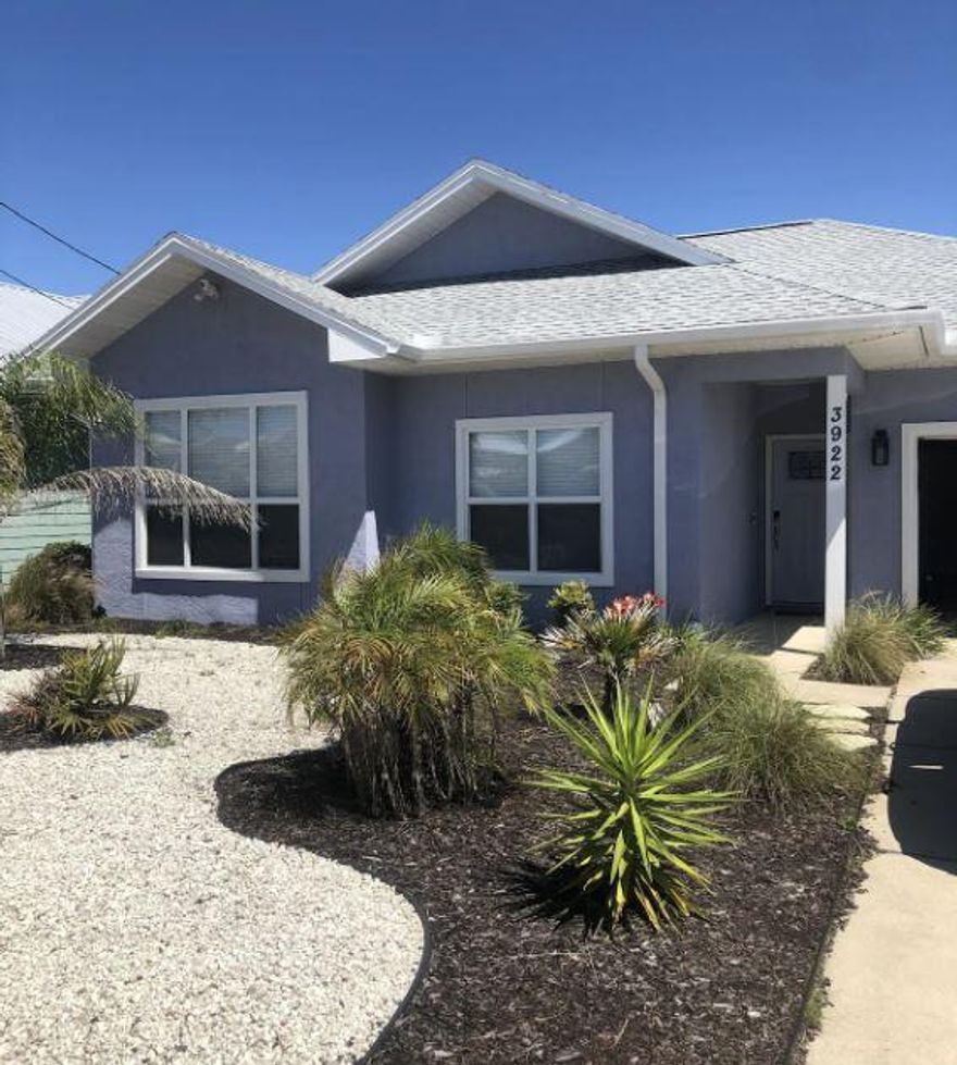 Located just minutes from the pristine white sand beaches and NO HOA! This beautiful 3 bedroom, 2 bath Beach House is near Beach Access #16 and Rick Seltzer Park. It is offered fully furnished, for immediate short term rental income or your personal beach home. It can accommodate up to 8-10 people. Entering the house, you will immediately notice the spacious open living area with 9' ceilings. Flooring is LVP and tile for easy cleaning. The kitchen has stainless steel appliances and also equipped with kitchen items such as pots & pans, plates, glasses, etc. The laundry is located in the garage, the washer and dryer do convey. The lawn is low maintenance and has a fenced back yard along with a covered patio. Short term rentals allowed in this area, no HOA and flood zone X. Roof 3yrs Old.