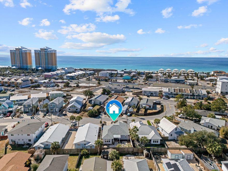 Reduced & a $5,000 seller concession offered toward buyer closing costs and/or a point buy down. Ideally located just minutes from the sugar-white sands of Panama City Beach, this fully furnished 3-bed, 2-bath home is perfect as a short-term rental investment or personal beach retreat. No HOA and short-term rentals allowed. Conveniently located near Beach Access #16 and Rick Seltzer Park. Inside features a bright open living area with 9' ceilings, durable LVP and tile flooring, and a kitchen with stainless steel appliances stocked for immediate use. Comfortably sleeps 8-10 guests. Additional highlights include a garage with laundry, low-maintenance landscaping, fenced backyard with covered patio, Flood Zone X, and a roof approx. 3 years old. Great opportunity to own close to the beach.