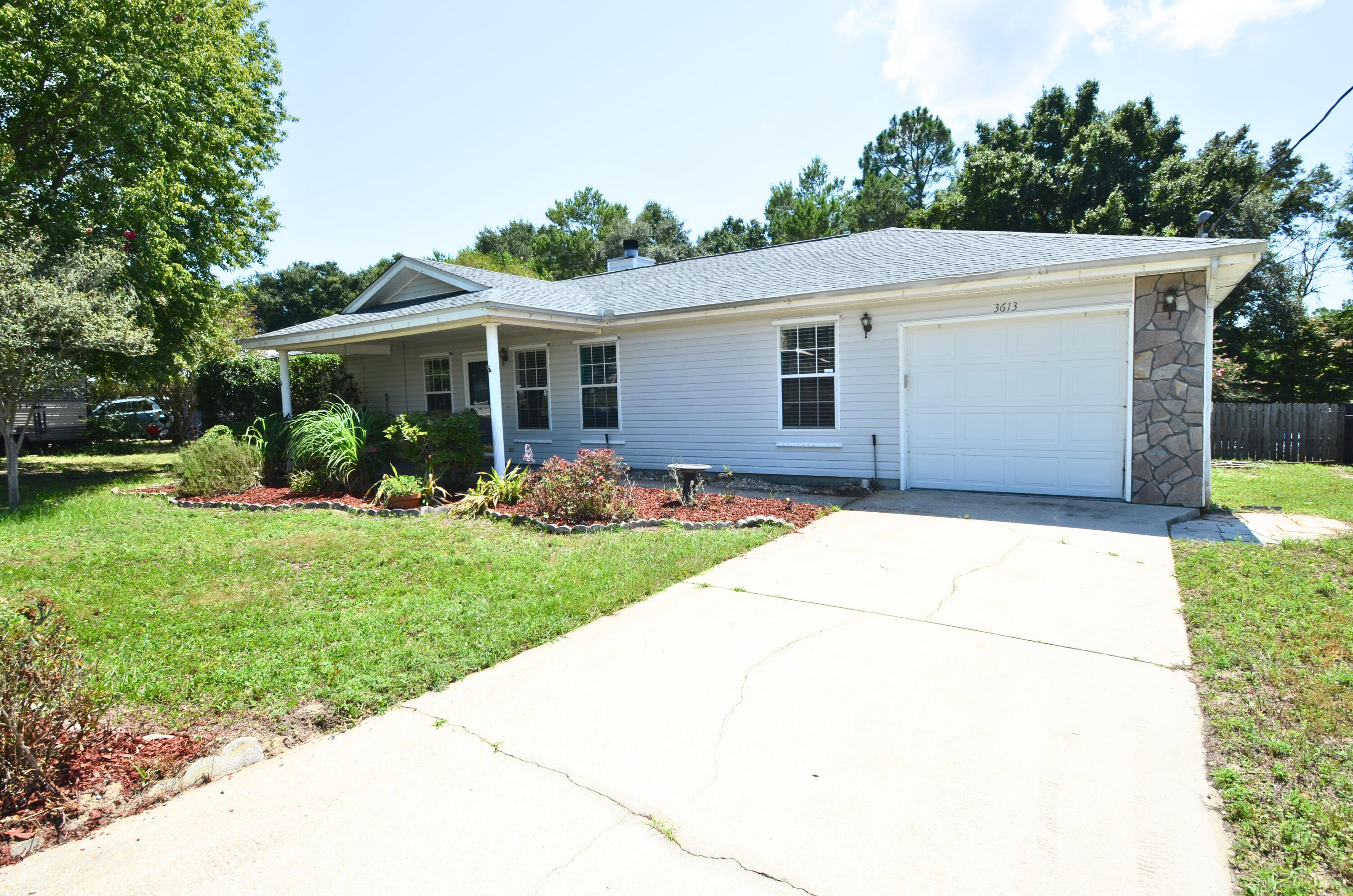 lluminated by the golden Floridian sun, 3613 Burton Cir in Navarre is a captivating retreat that promises both comfort and charm. This delightful 3-bedroom, 2-bathroom home sprawls over 1,566 square feet, offering ample space for relaxation and entertainment. As you step inside, you're greeted by an inviting atmosphere that creates an ideal sanctuary for unwinding after a long day. The open floor plan seamlessly integrates the living areas, encouraging a natural flow from room to room. Outside, the large backyard is fenced in. Cats and Large dogs (up to 50lbs fully grown) accepted with $350 pet fee per pet and 10 per month pet rent for each pet. Residents are enrolled in the Coastal Realty Services Resident Benefits Package (RBP), which includes renters insurance, HVAC air filter delivery, a resident rewards program, and more!
Please contact the office (not the listing agent below) directly at 850.244.2100 for additional information. Showings can be scheduled via the website www.CoastalRealtyServices.com. Prior to us processing an application on a rental property, we do require the rental to be viewed by the applicant or a representative of the applicant.