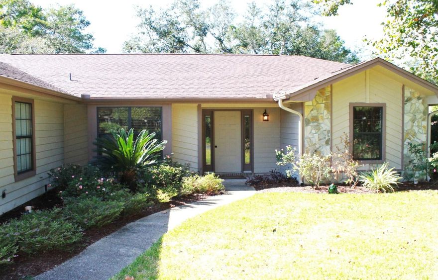 MOVE IN READY and UPGRADES GALORE!! This 3 bedroom, 2 bath home with a large Florida Room, is ready for its new family. New flooring throughout, tile, laminate and carpet, New Roof, New A/C System and New Interior Paint. The kitchen has been completely remodeled with granite counter tops and New Cabinets. The spacious backyard is complemented with a large deck, mature trees and privacy fence. The back yard is definitely large enough to accommodate a pool. Close to the Award Winning Bluewater Elementary, shopping, golf and 2 miles from the Mid Bay Bridge. Pictures do not do this home any justice, make your appointment today to preview this incredible home.