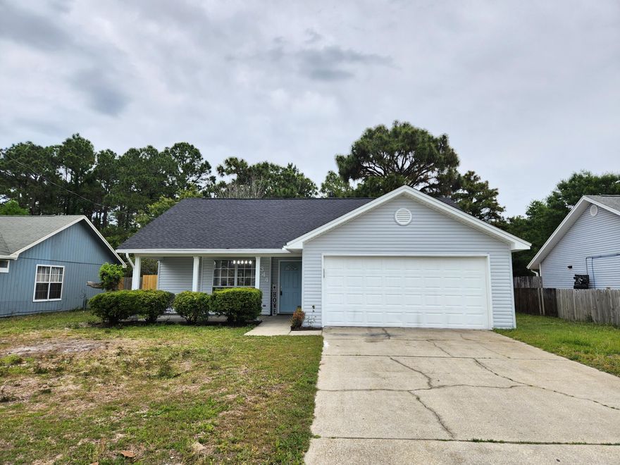 Welcome home! Stunning 3 bedroom 2 bath home for sale in desirable Mary Esther. This charming property features fresh paint, new appliances, new flooring, and a brand new roof! Inviting front porch, perfect for sipping coffee. Inside you will find a spacious eat-in kitchen with breakfast bar and ample counter top space. The kitchen overlooks the large living room with tall ceilings and fireplace. French doors from the living room lead out to the massive back yard and open patio. Pantry in the kitchen. Indoor laundry room. Down the hall you will find a huge storage closet, plus two spare bedrooms and a full bathroom. To the right and through the double-doors in the spacious master bedroom, complete with large walk in closet and attached full bath. Come take a look before this one is gone!