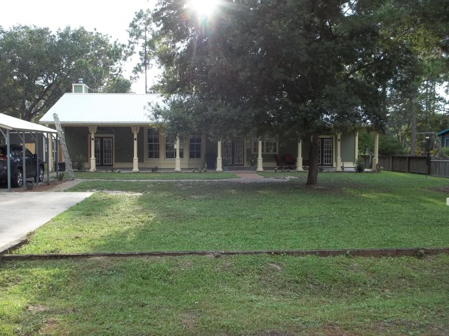 Custom built 2 bedroom 2 bath home with open floor plan. Home has 2 Master Suites. One Master has a wood burning fireplace, it's bath has a large jetted tub and a walk in shower. The second Master bath has a shower only and a very large closet.  Home has a beautiful large kitchen with lots of granite counter space. Most of the interior walls are nickel-gap tongue and groove. The home was renovated in 2018, to include new roof, HVAC, flooring, paint and appliances. Front porch expands the entire length of home. If you prefer a home that is not a cookie cutter home and no HOA's then this home is for you.All matters of importance must be verified by buyer.