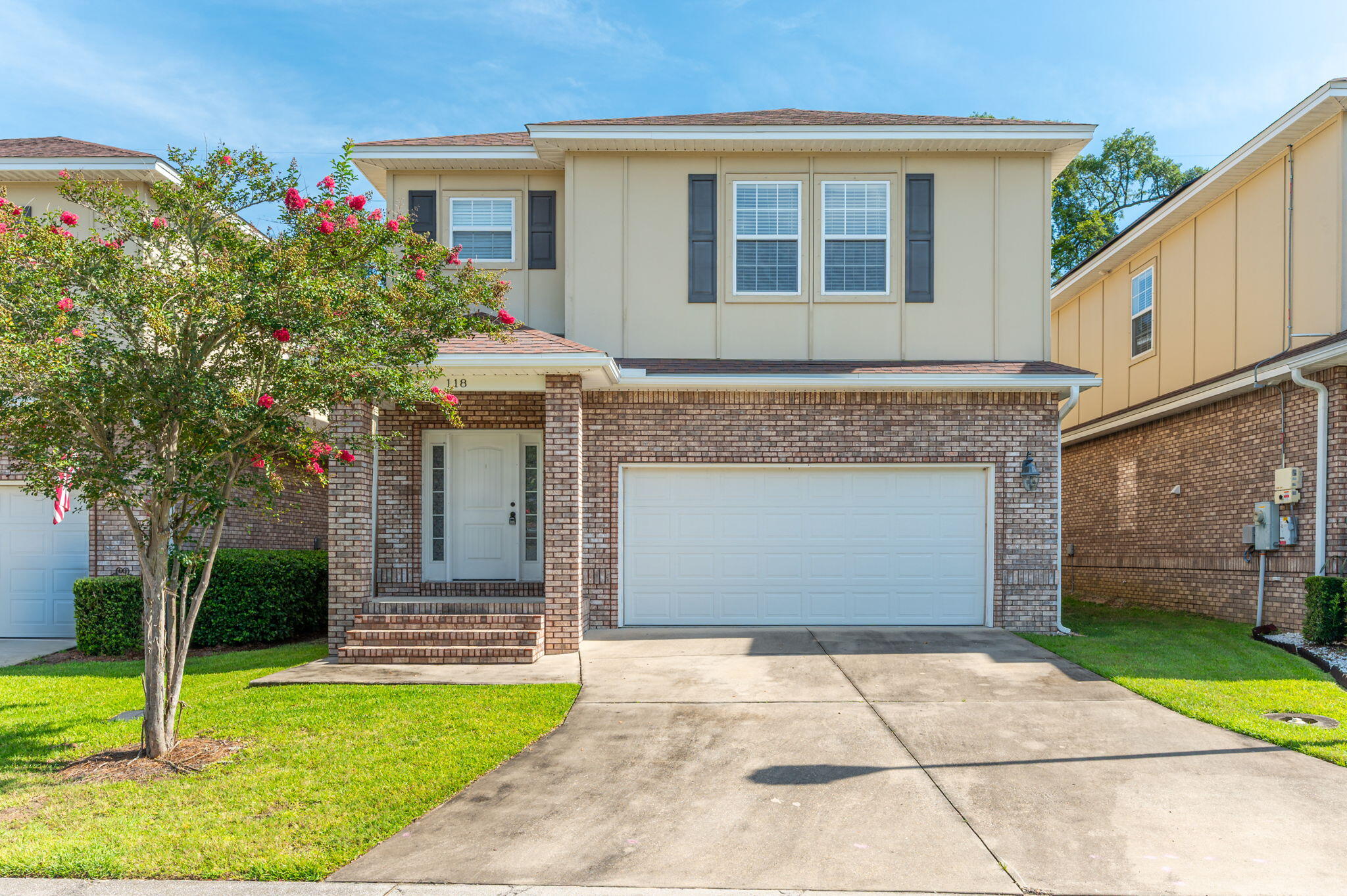 Welcome to 118 Big Oaks Lane, a beautifully maintained 4-bedroom, 2.5-bath home in the Niceville's sought-after Walton Oaks neighborhood. Built in 2015 and offering nearly 2,000 square feet of living space, this two-story residence features an open-concept floor plan with hardwood floors, crown molding, and a chefs kitchen complete with granite countertops and stainless steel appliances. The spacious primary suite includes a tiled shower, garden tub, and dual vanities, while 3 additional bedrooms provide plenty of room for family or guests. Step outside to enjoy a screened-in back patio and fully fenced backyard, perfect for relaxing year-round. Located just minutes from Turkey Creek Park, Eglin AFB, top-rated schools, and the beaches of Destin. This listing won't last long! Call today! New stainless steel refrigerator, full interior re-paint, and new carpet throughout the second floor.