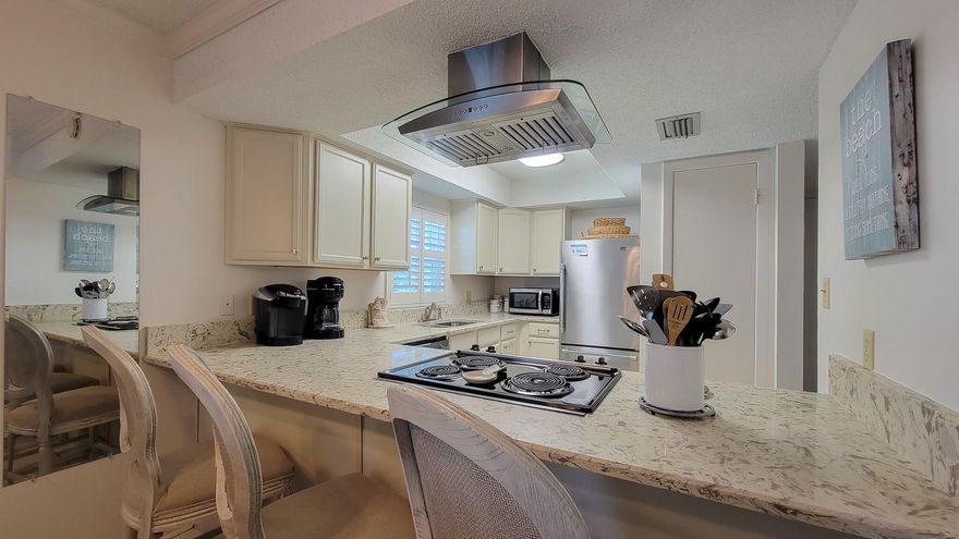 Rental Ready!! GROUND FLOOR END UNIT at the beautiful, gated community of El Matador, located at the end of Okaloosa Island. EASE OF ACCESS!! Condo is situated in building 3 near the community pool and beach!! Inside, kitchen features granite countertops, stainless-steel appliances, range hood, & breakfast bar for additional seating. Living/Dining is spacious and has plantation shutters on windows. Master BR has a private full bathroom with tub/shower combo and large closet. Also has its own patio walkout! Guest BR and bath are on the opposite end of the condo. Tile in common areas, carpet in bedrooms. First floor unit with convenience to come and go from the pool or beach as you please!! The bldg has recently been upgraded with hurricane rated sliding doors & windows. new roof & paint.
