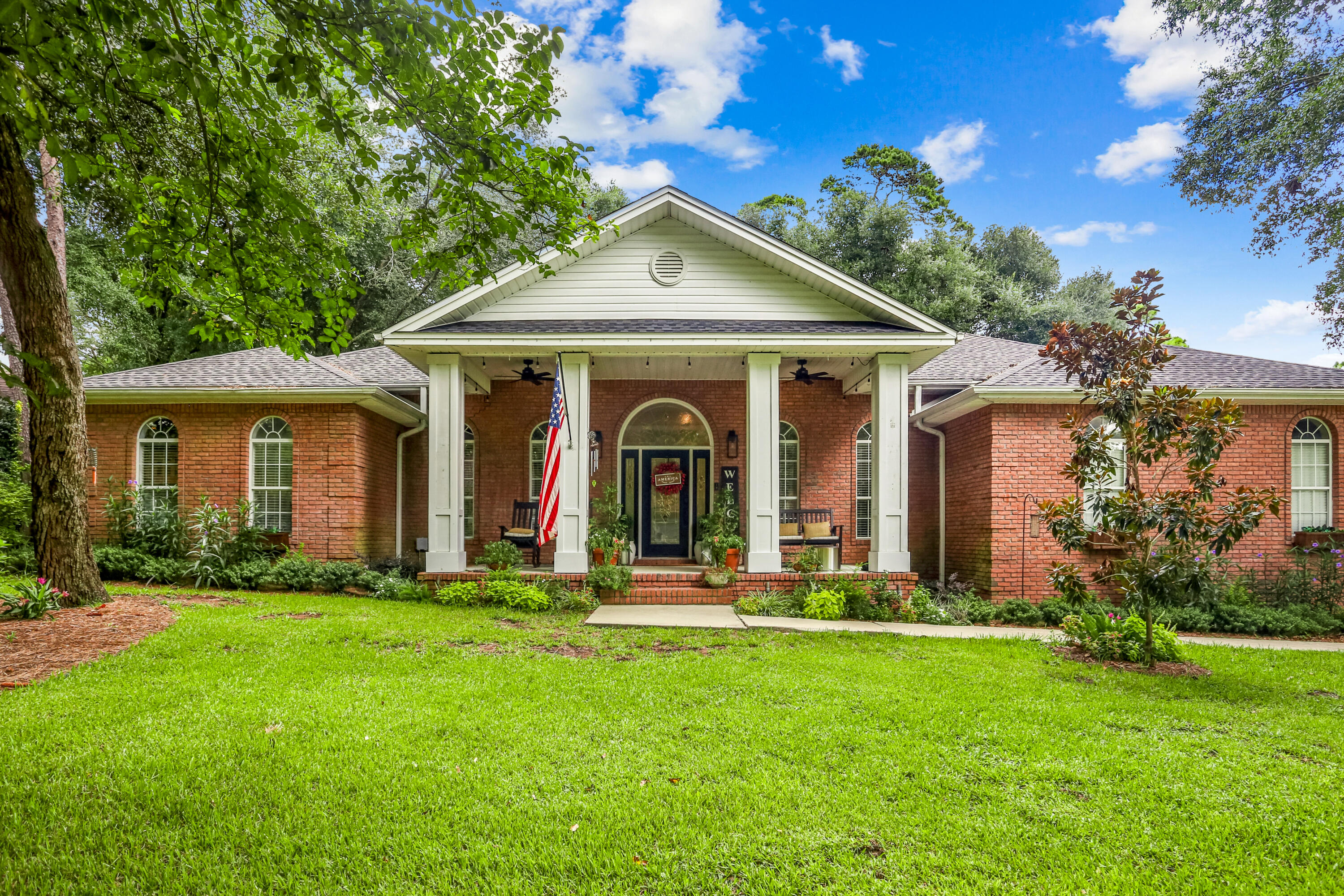 Tucked away in the coveted Swift Creek neighborhood that offers amenities galore - pool, clubhouse, tennis court, basketball court, lake w/dock for fishing, playground and nature trail! AND you're going to love what this newly renovated custom-built brick home has to offer! Updated throughout to give you that modern look and feel with great attention to detail. The floor plan boasts 4 well-appointed bedrooms, 3 full bathrooms, a formal dining room, spacious kitchen, office/den, laundry room and large garage with attic storage. The living space has a beautiful gas fireplace with built-ins for your extras. Tray ceilings and crown molding are recognized throughout the home. The gourmet kitchen has been completely re-designed with stylish cabinetry & counters, functional layout, KitchenAid gas range - microwave - dishwasher, and pot filler - catering to the culinary enthusiast...and note the beverage fridge! The master bedroom is located adjacent to the kitchen and includes a large, beautiful ensuite with separate cultured marble shower, whirlpool tub, lots of storage & a large walk-in closet. Other features of this property include southern style front porch, covered and open back patio spaces, double gate access to backyard, and mature landscaping with sprinkler system. Call today to schedule your showing!